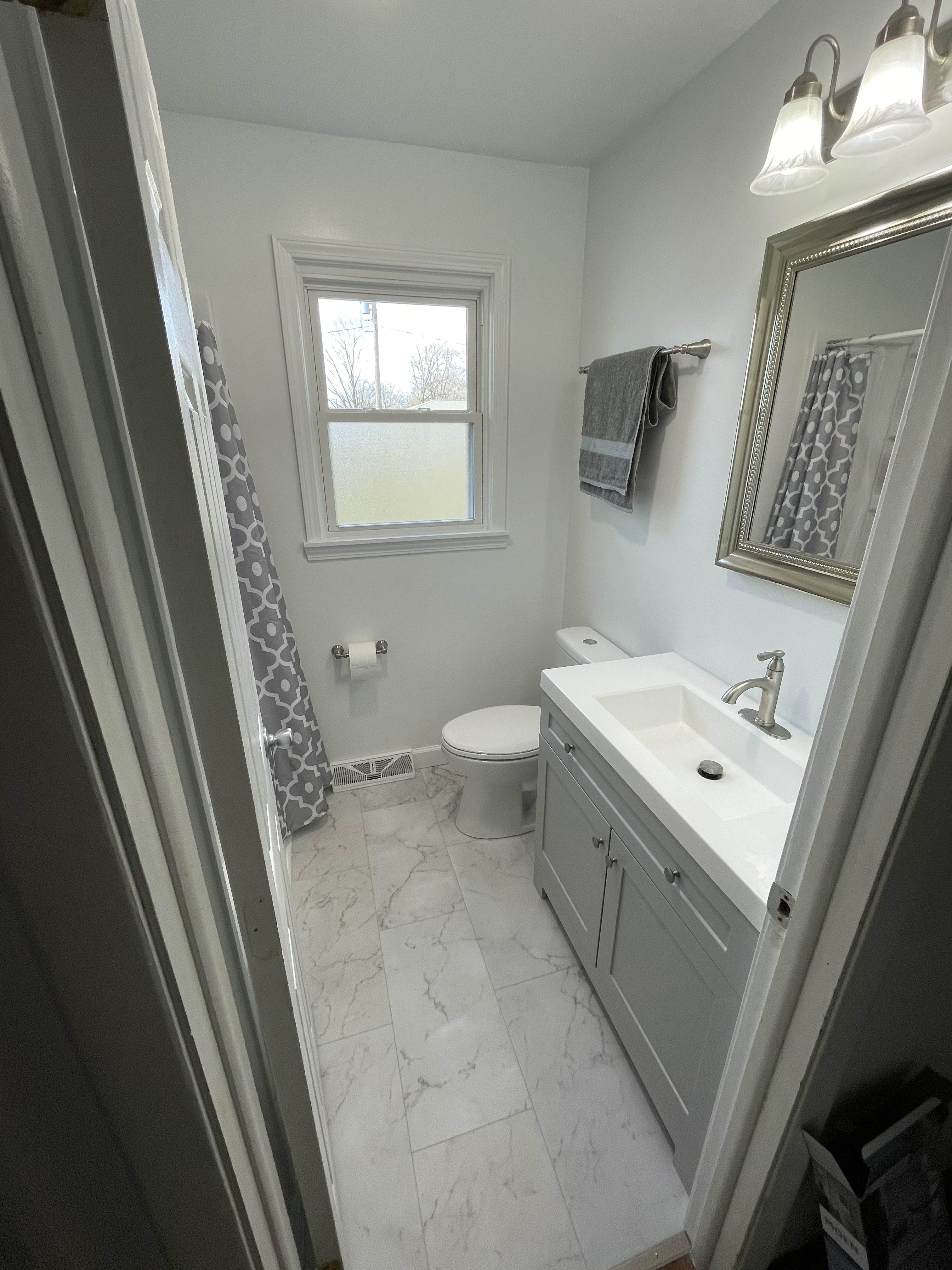 Bathroom vanity and tile floor