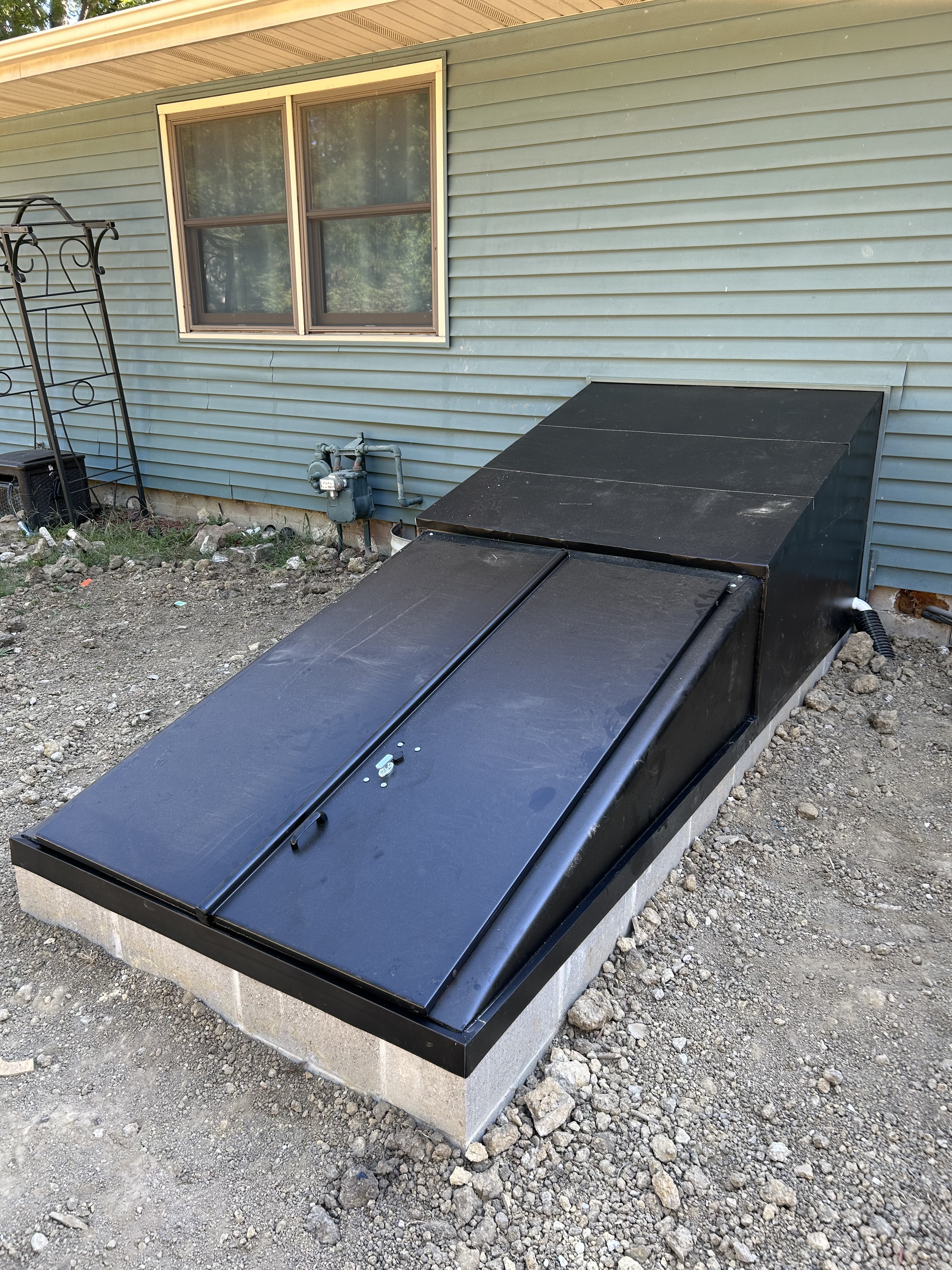 New metal cellar entrance doors