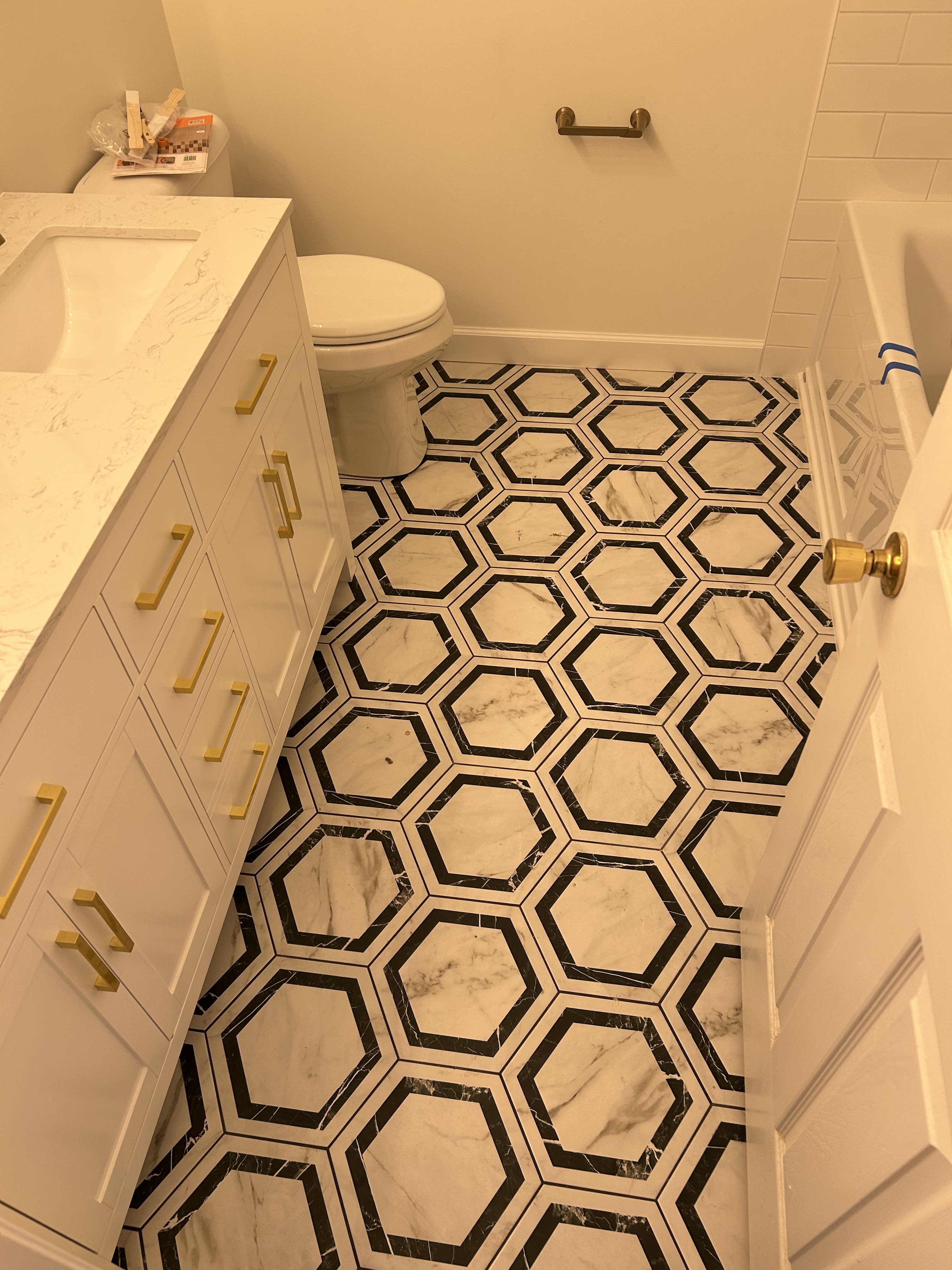Patterned tile bathroom floor