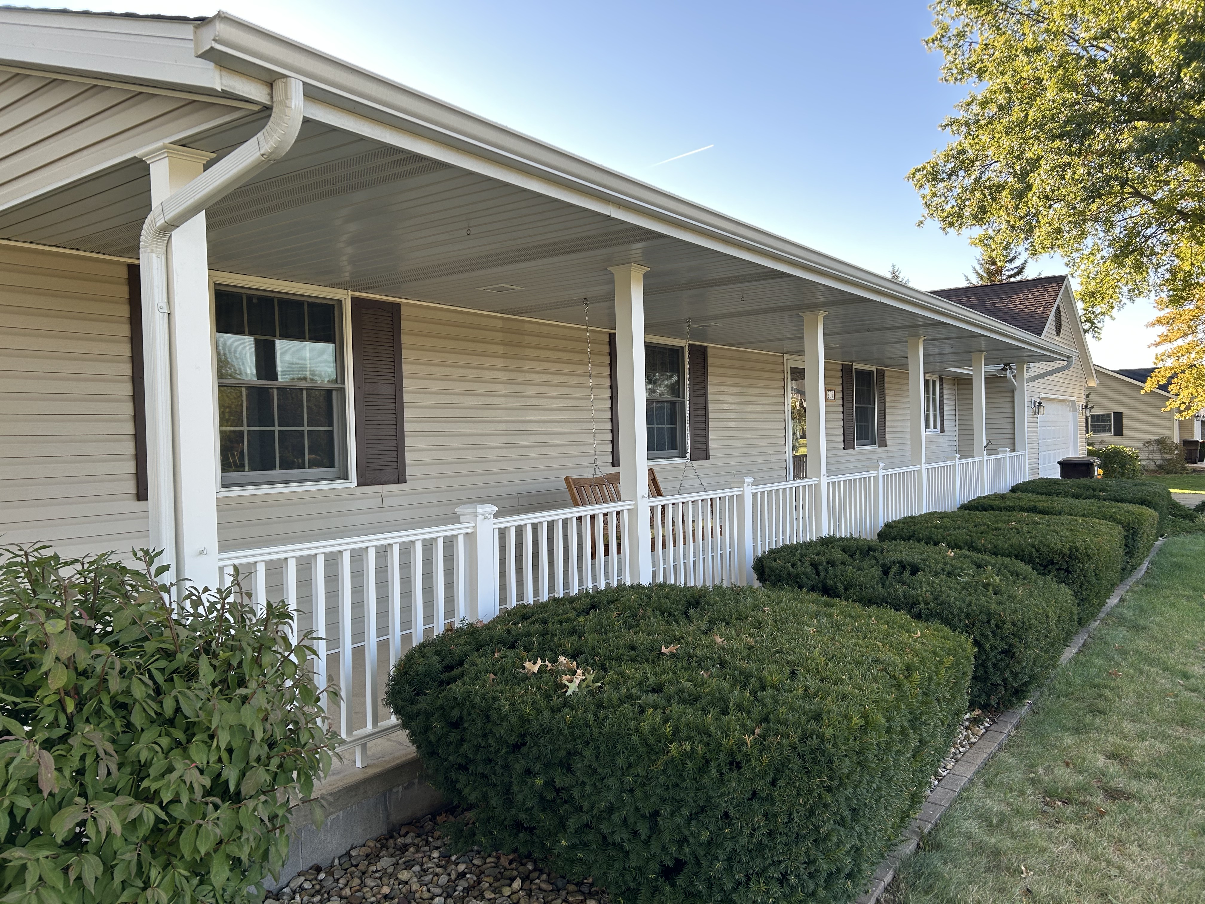 Front porch with new white railing