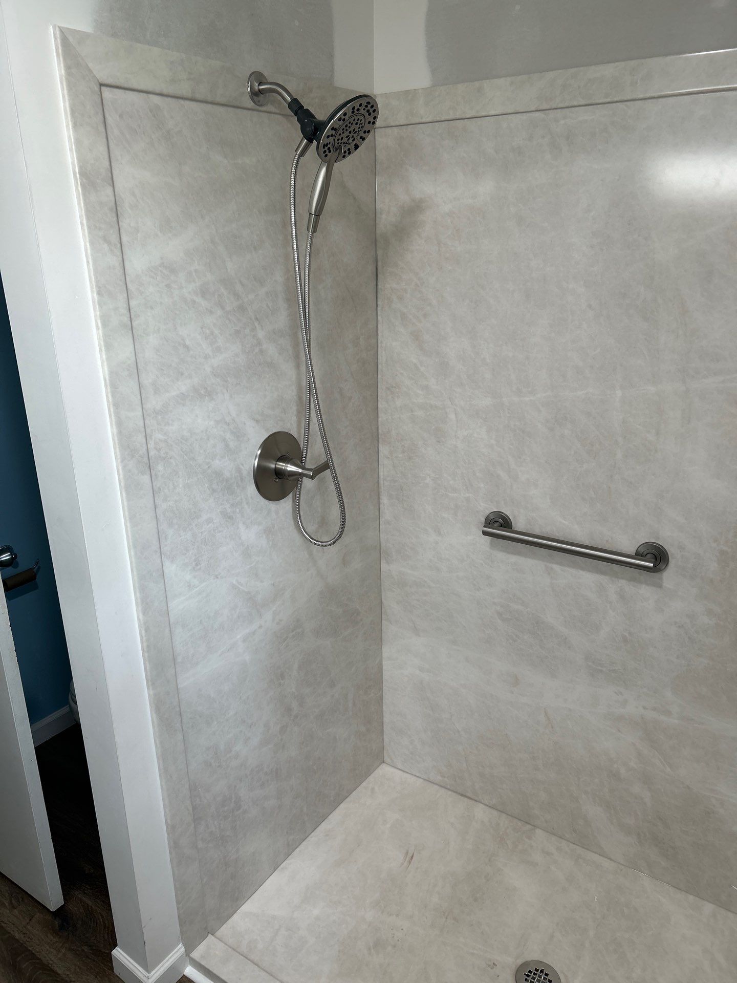 Shower with a grab bar