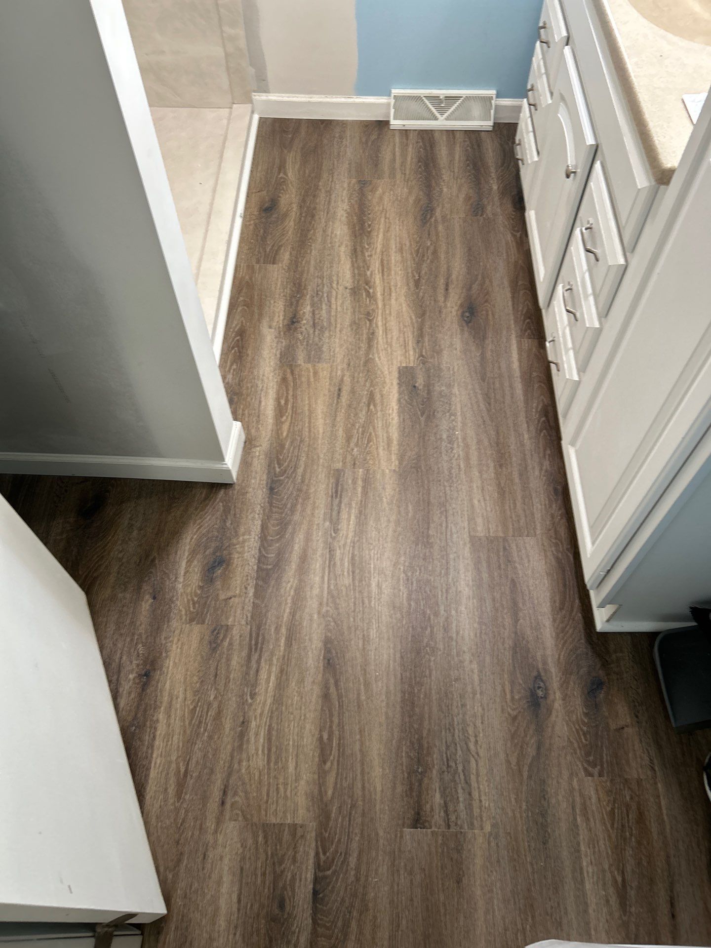 Wood-look flooring in a finished bathroom