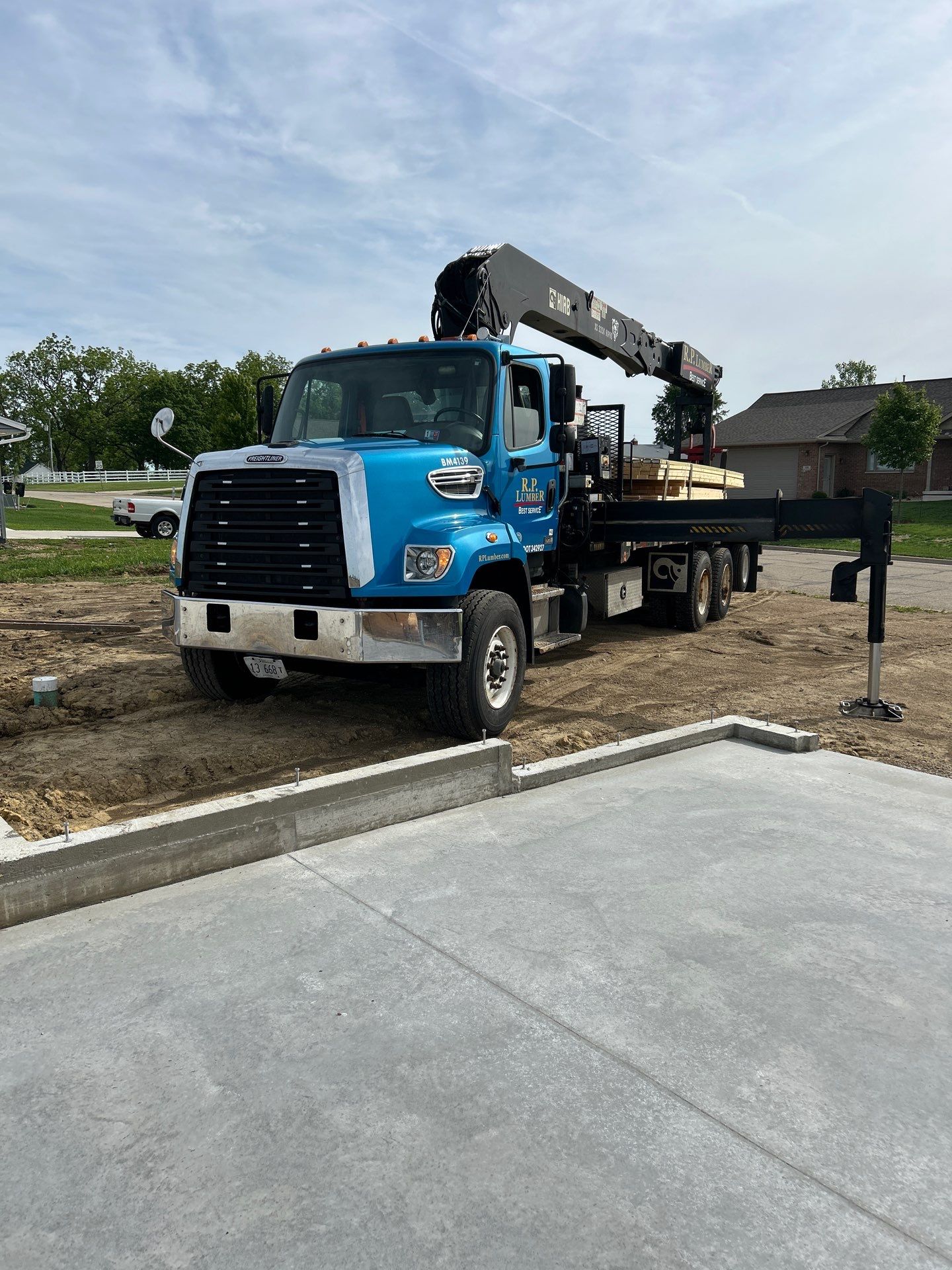 Lumber delivered to a new home site (work in progress)