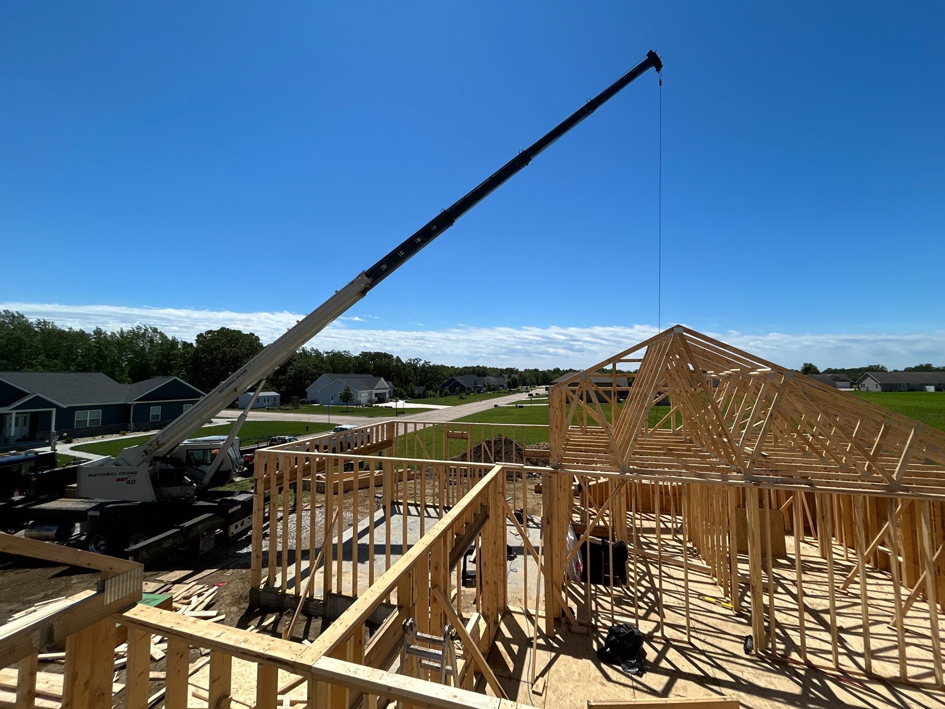 Roof trusses set by crane