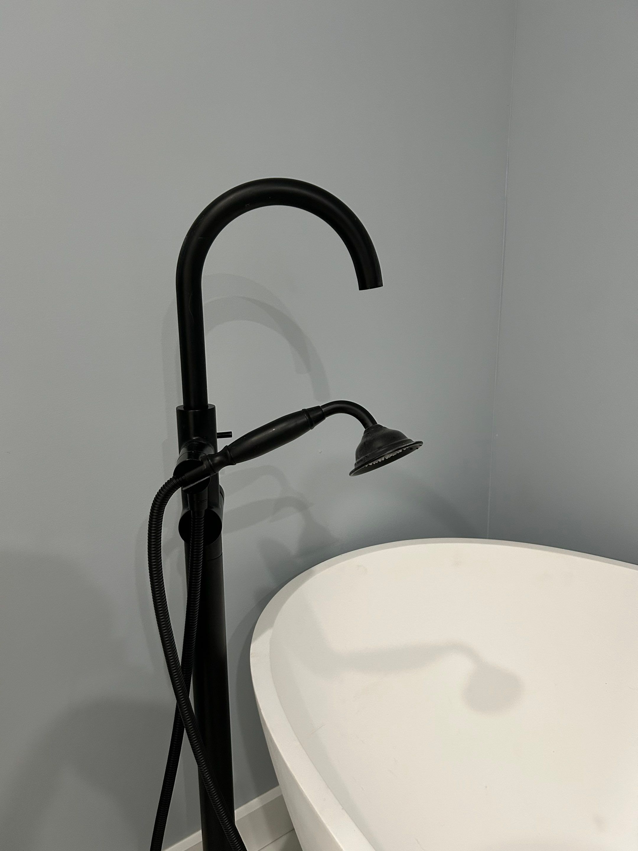 Freestanding tub and floor faucet