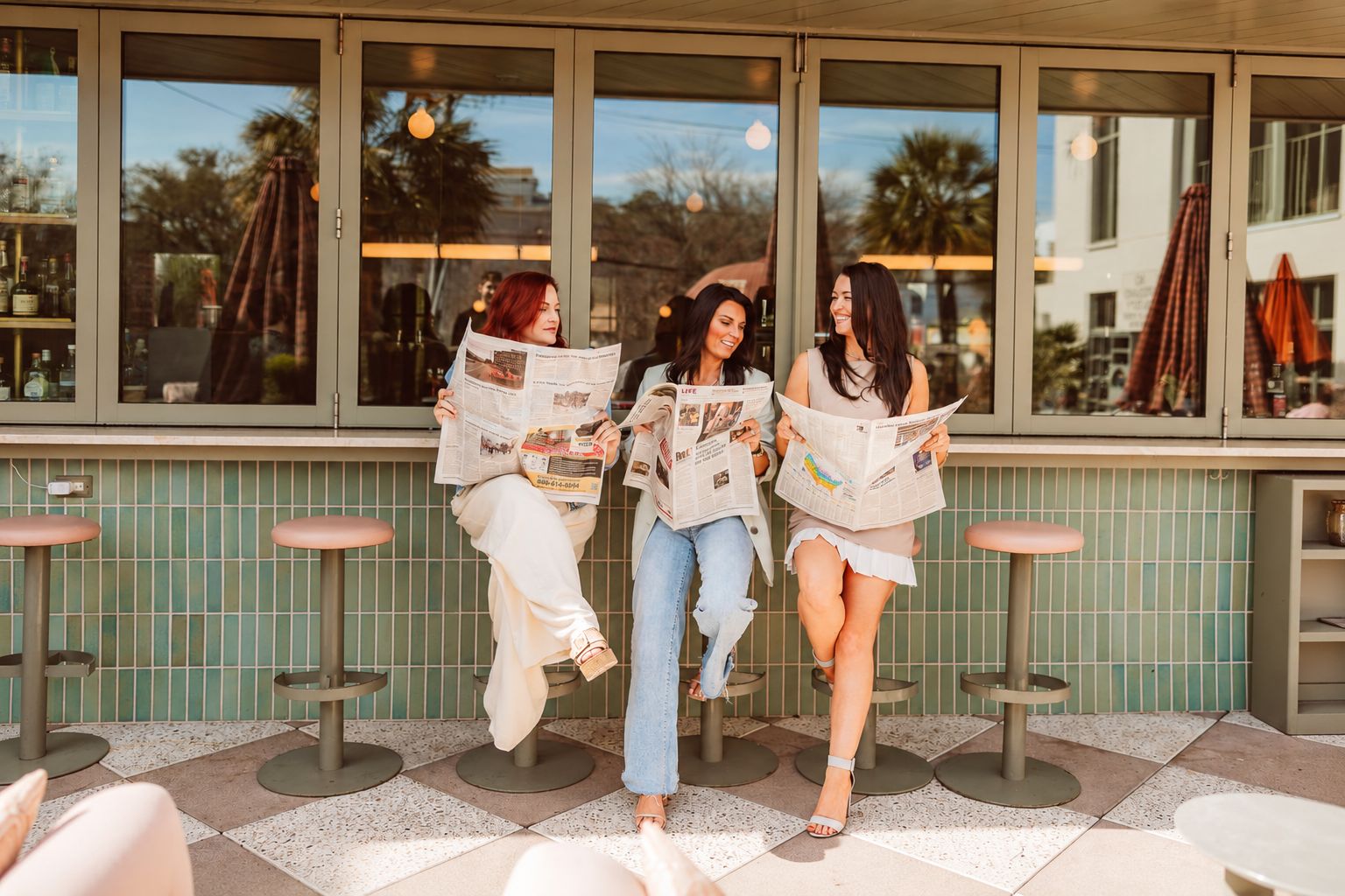 Haley Ebersole, Amy Nienstedt, and Lynnmarie Solon of Palmetto Elite Group laughing together