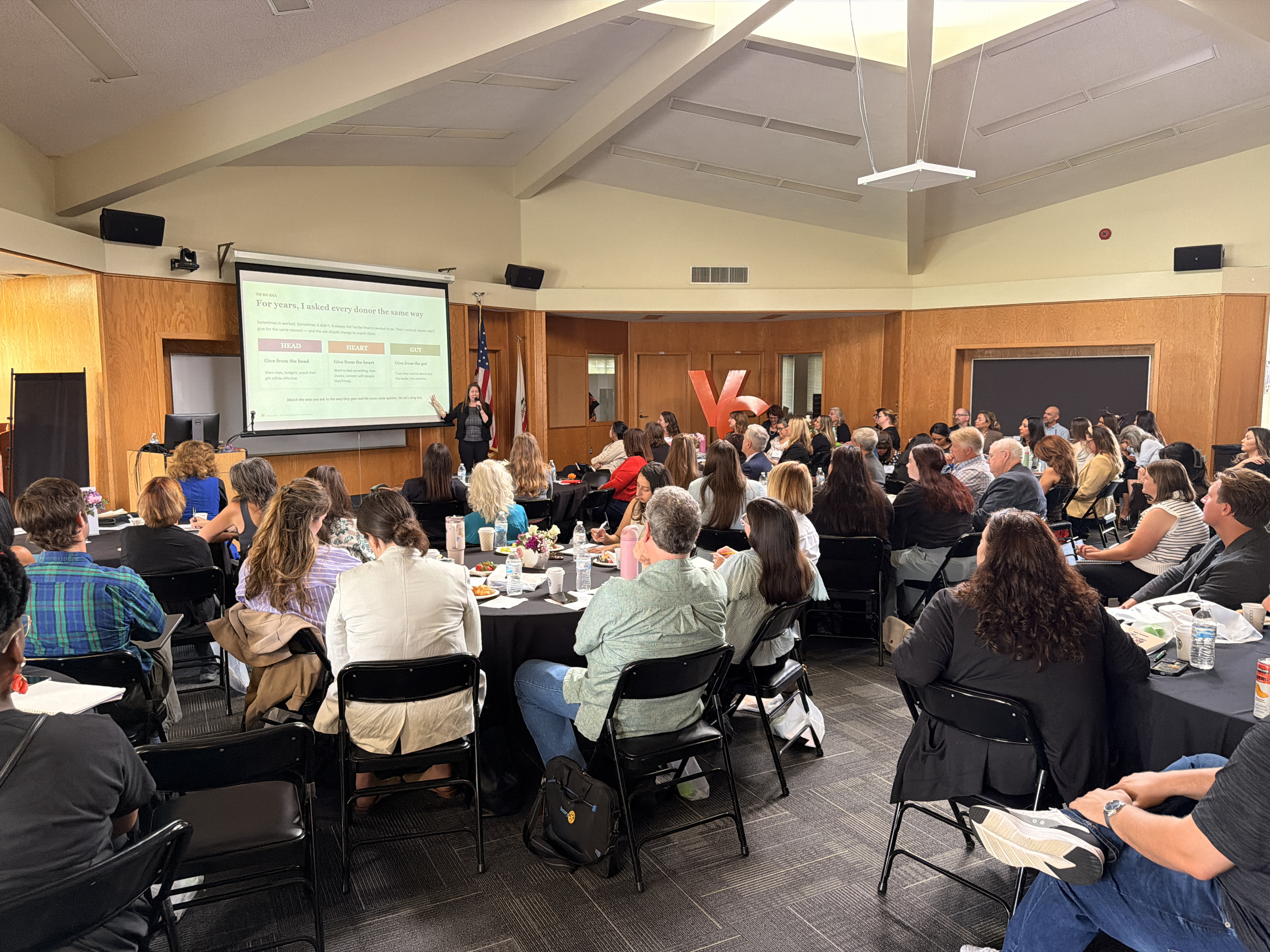Room of fundraisers actively collaborating during the retreat