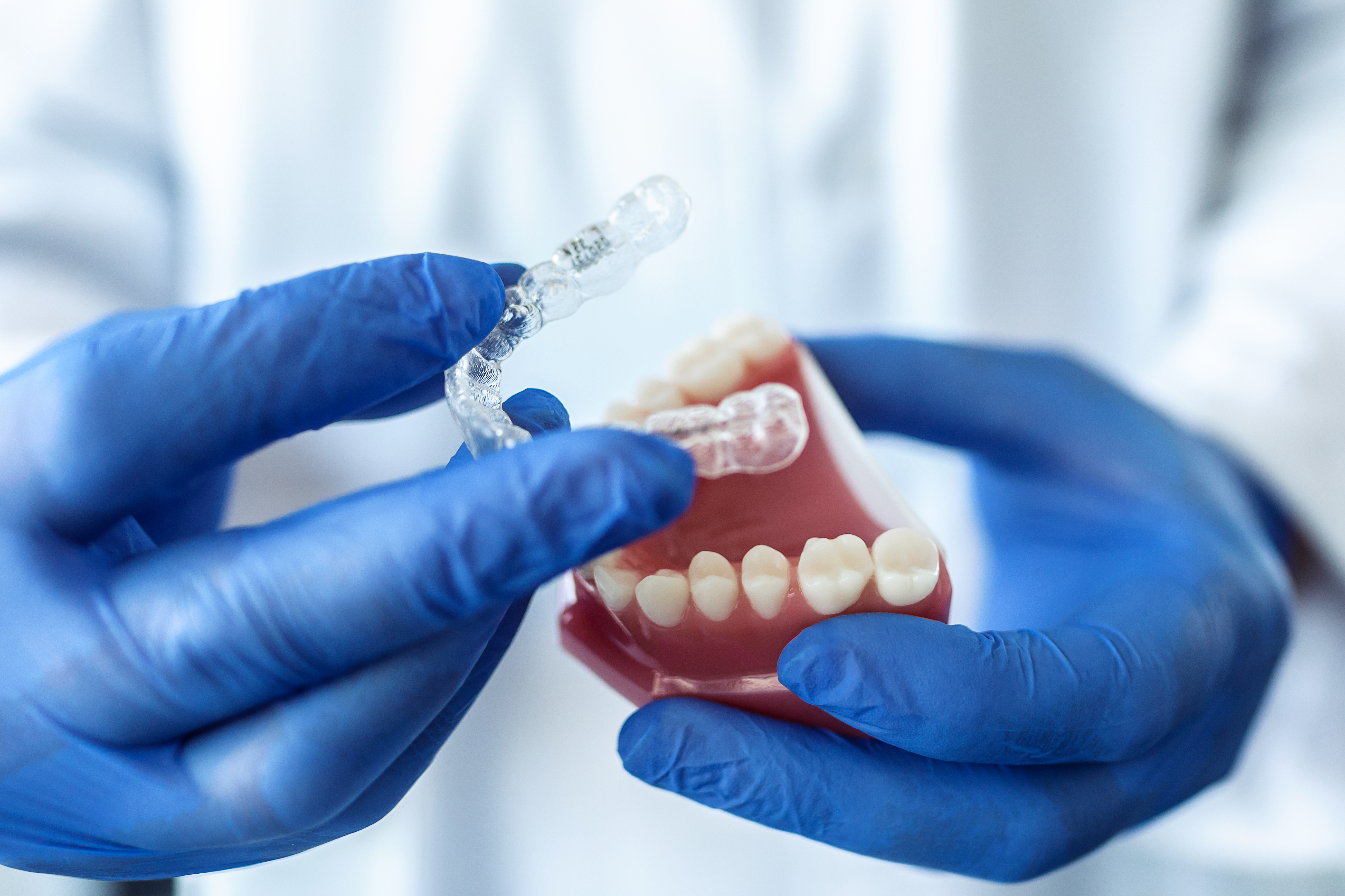 Dr. Raymond Huang with a patient at BrightRay Dental