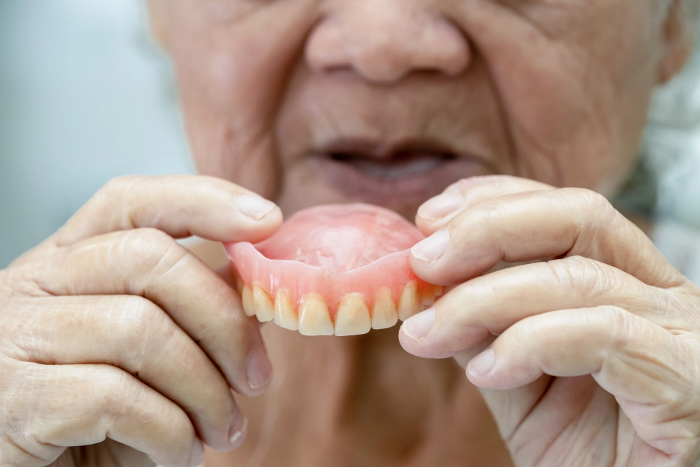 Removable denture or partial
