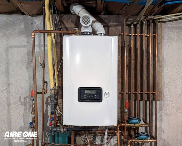 S&K clean manifold and plumbing rough-in installation for high-efficiency water heating systems