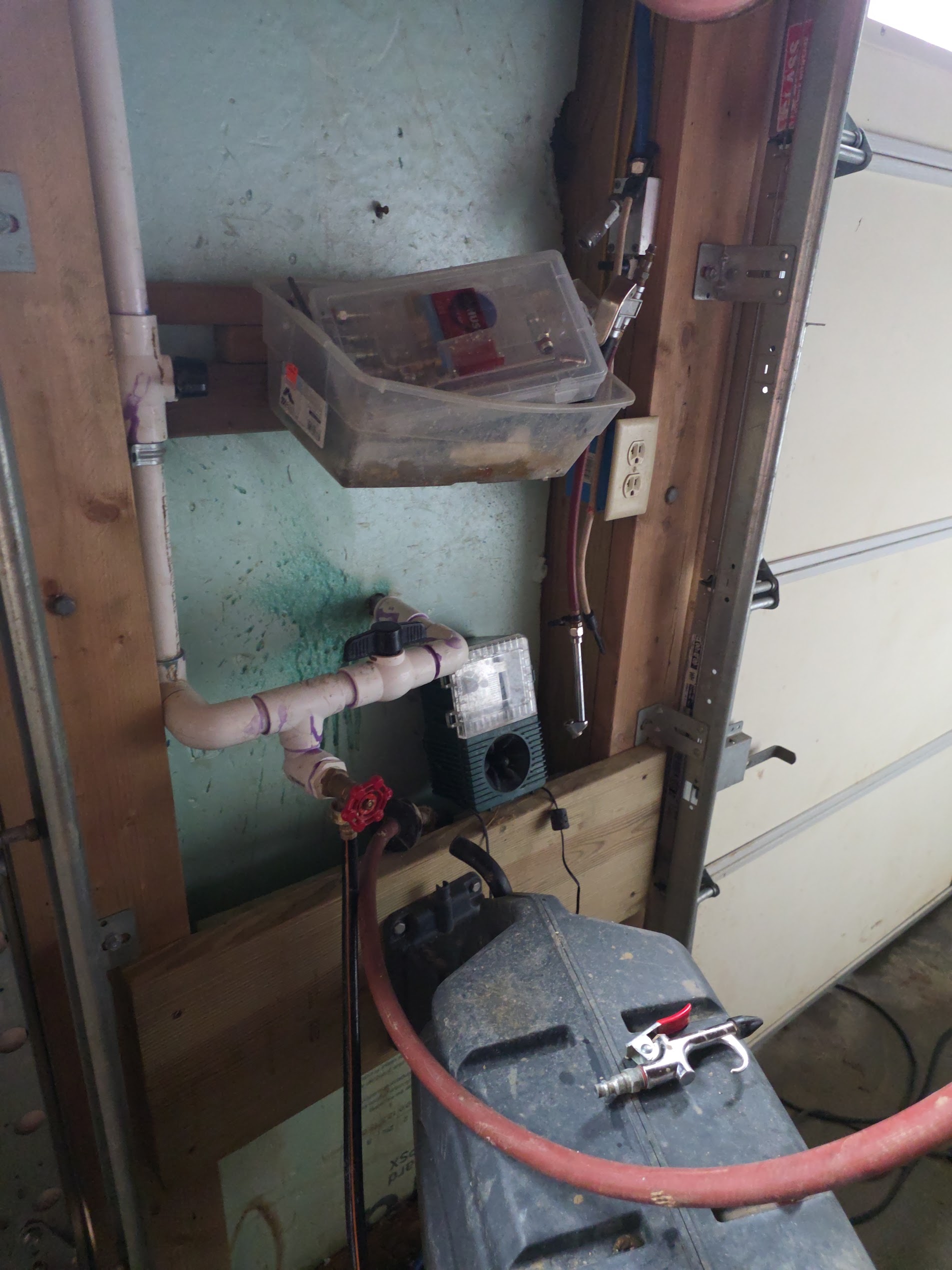 S&K technician inspecting overhead utility and gas piping network on job site