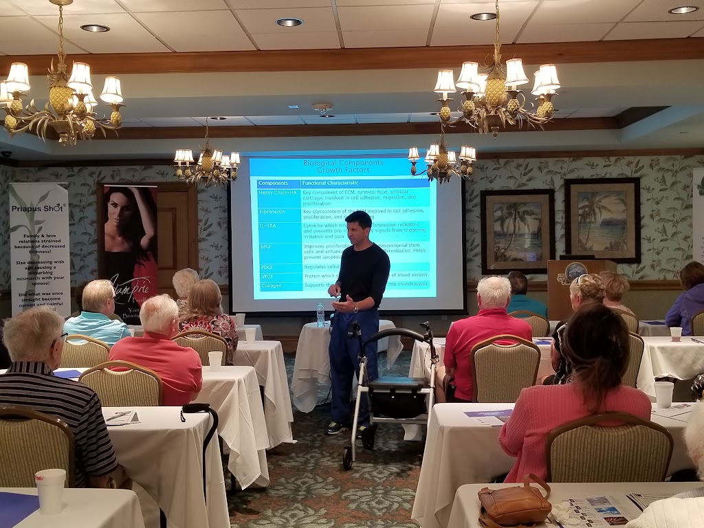 James Epolito presenting regenerative medicine education to a live seminar audience