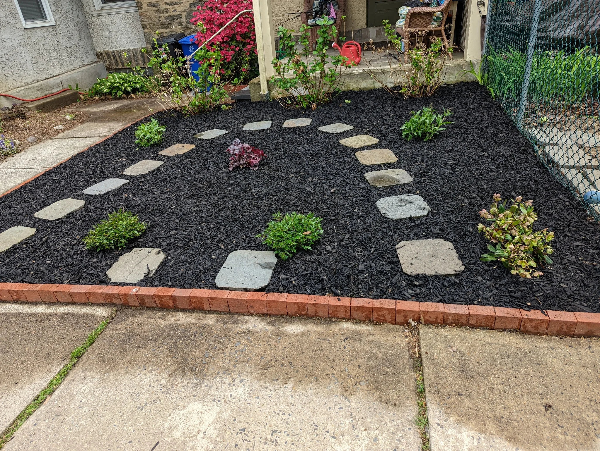 Neatly edged and mulched landscape bed