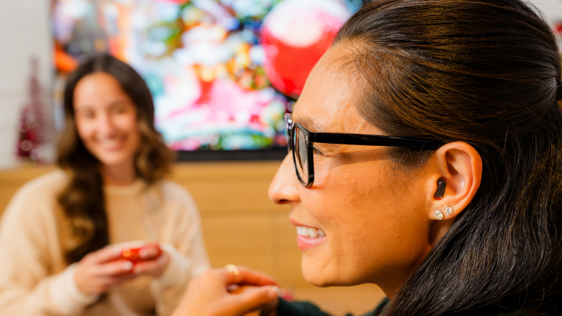 Sony CRE-C20 nearly invisible CIC hearing aid worn in ear