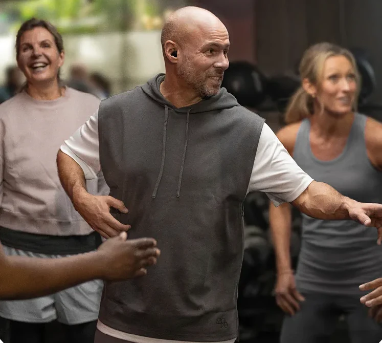 Active adult enjoying clear hearing with Signia Active IX