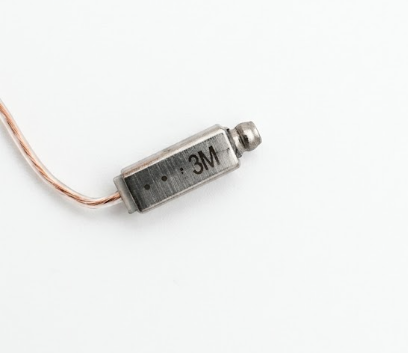 Close-up of the receiver connector end showing the printed length and power strength markings