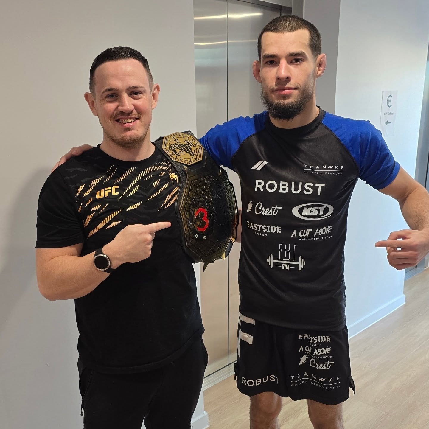 Omar, Cage Warriors champion, with Campbell
