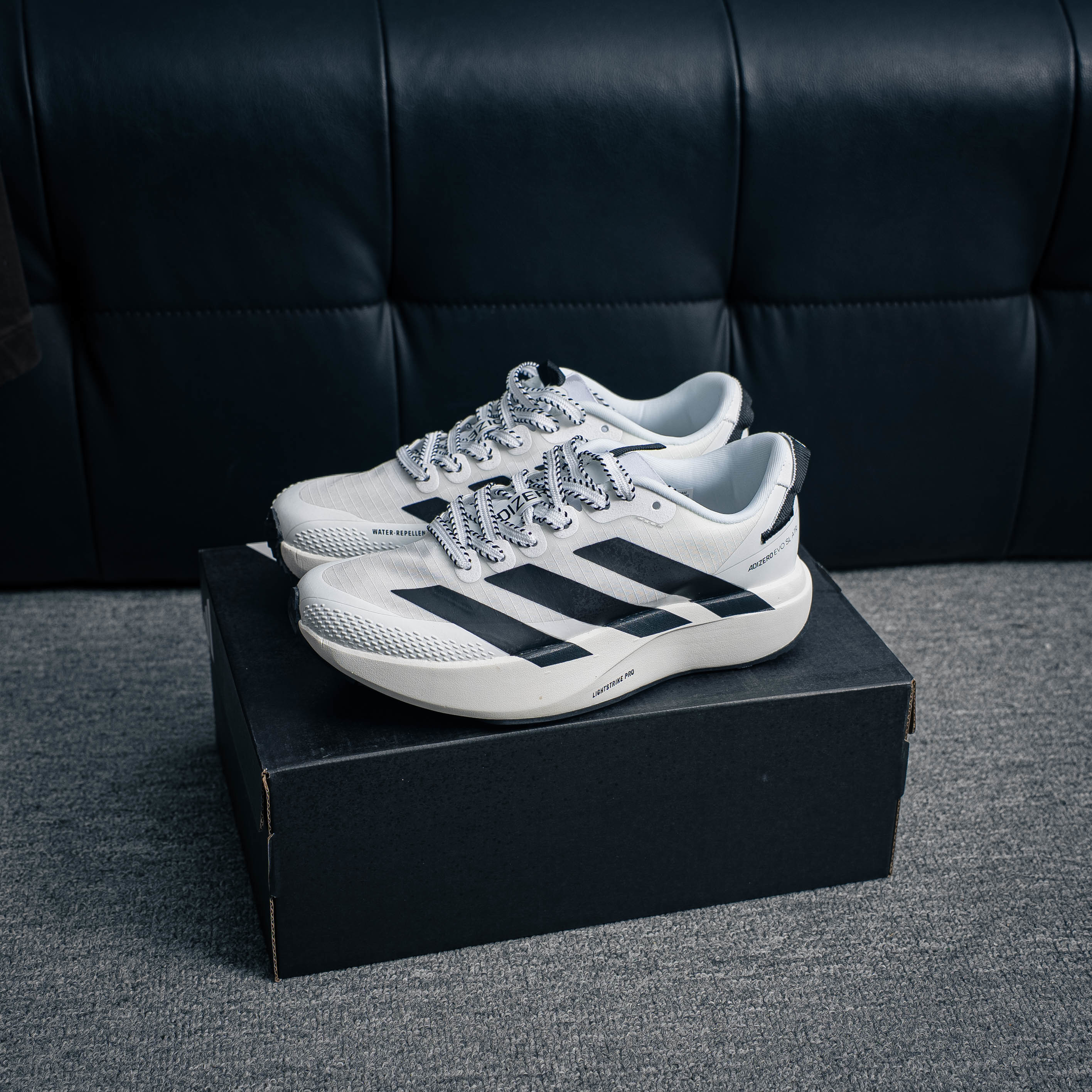 Adidas Adizero Evo SL — Branco e preto