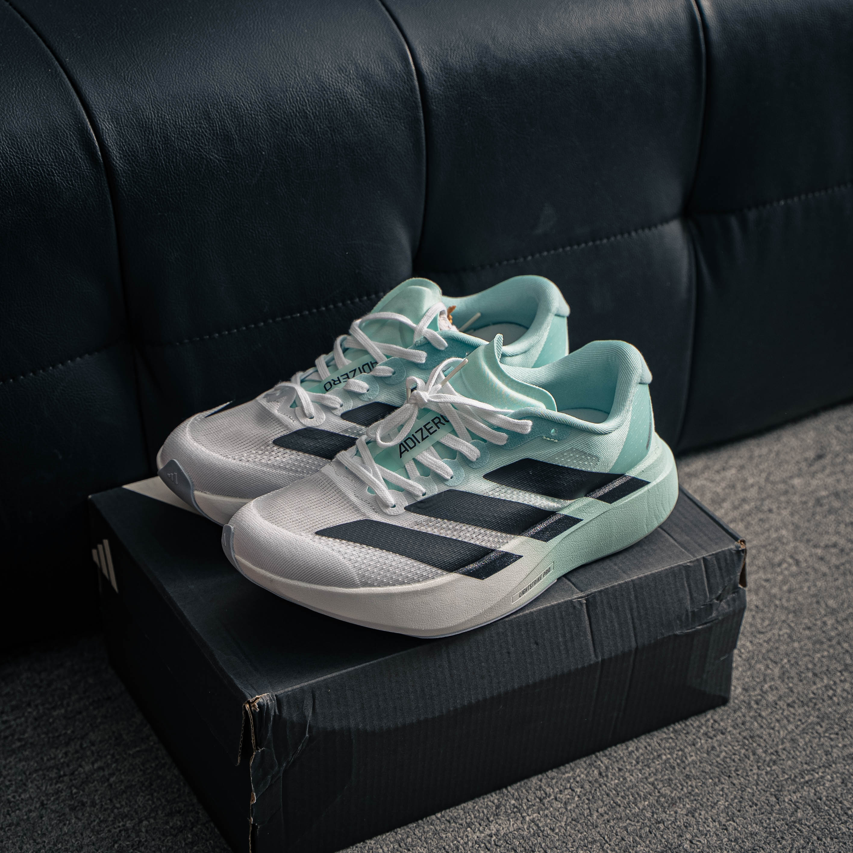 Adidas Adizero Evo SL — Branco e verde-água