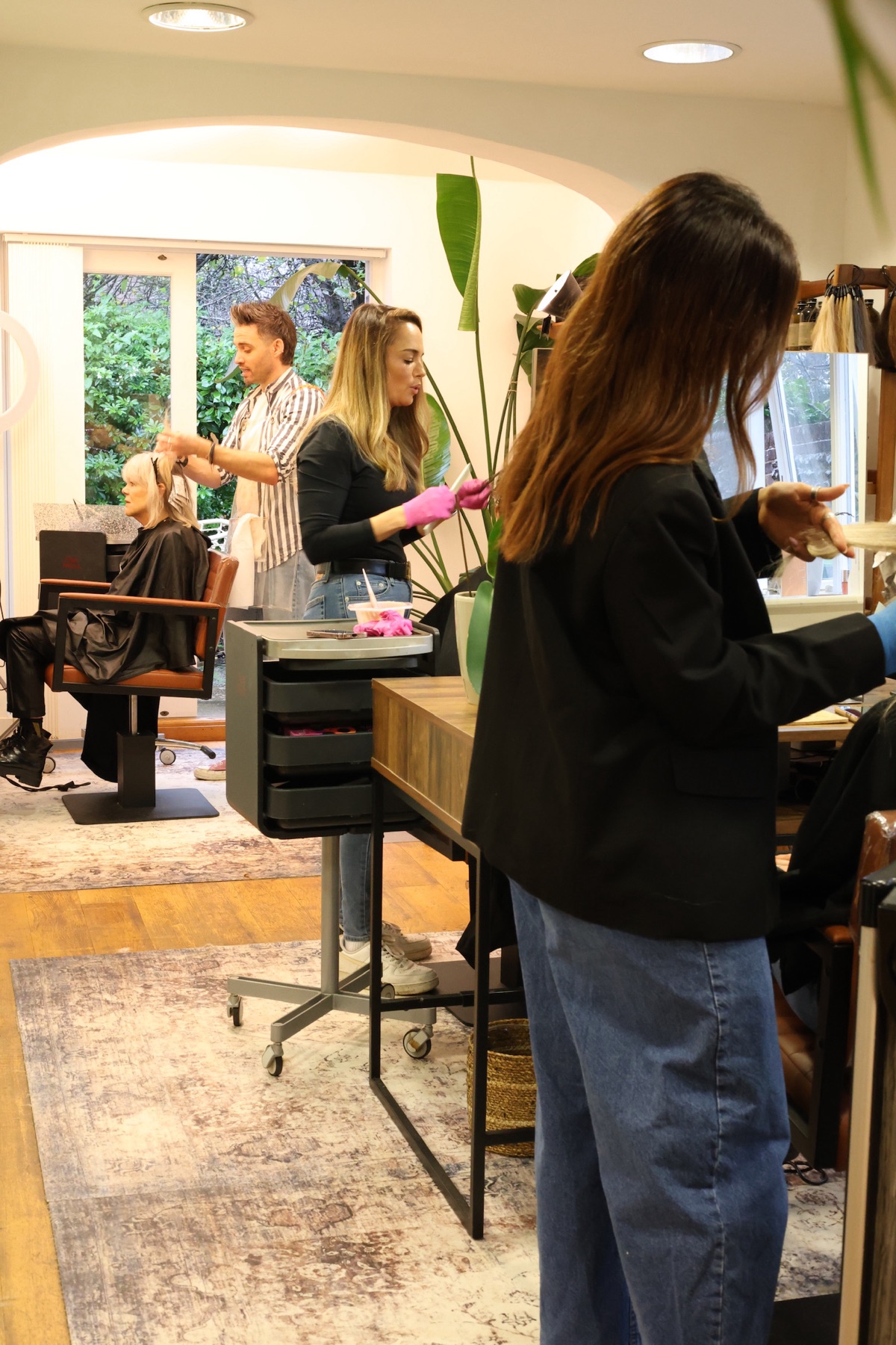 Artists at work on the salon floor at CLAY