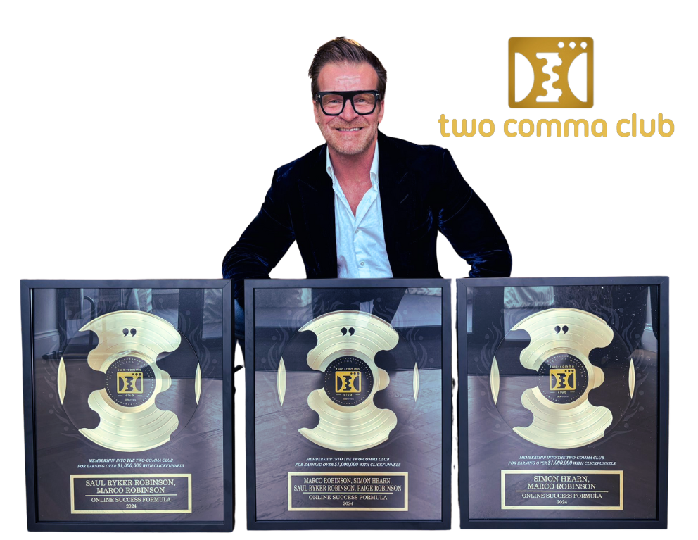Marco Robinson with Two Comma Club awards
