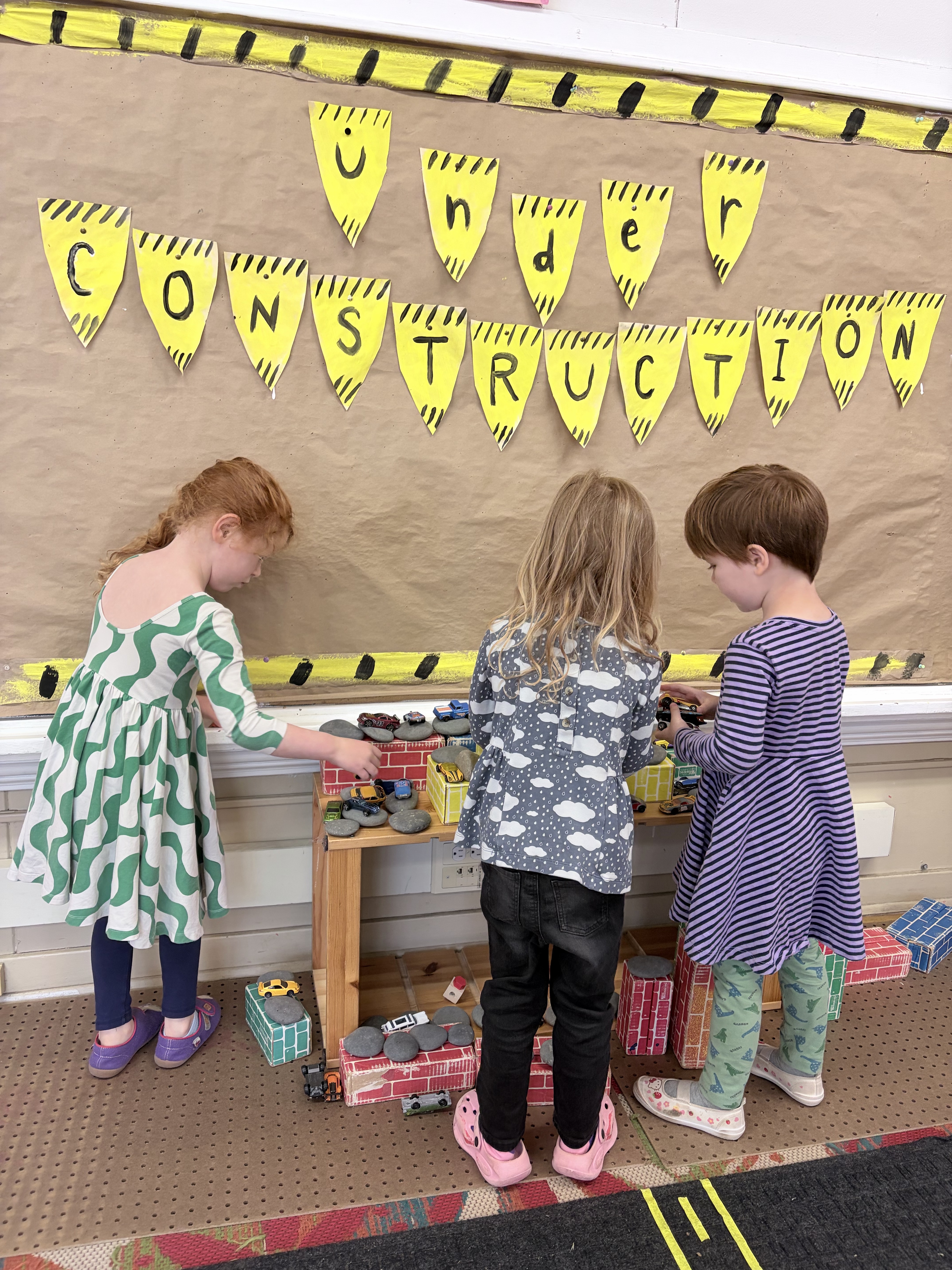 Children learning together at Cherish Academy