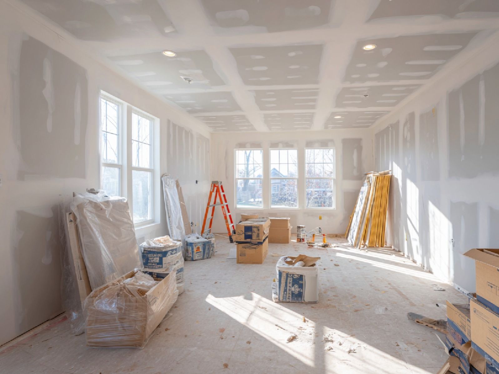 Professional drywall contractor at work