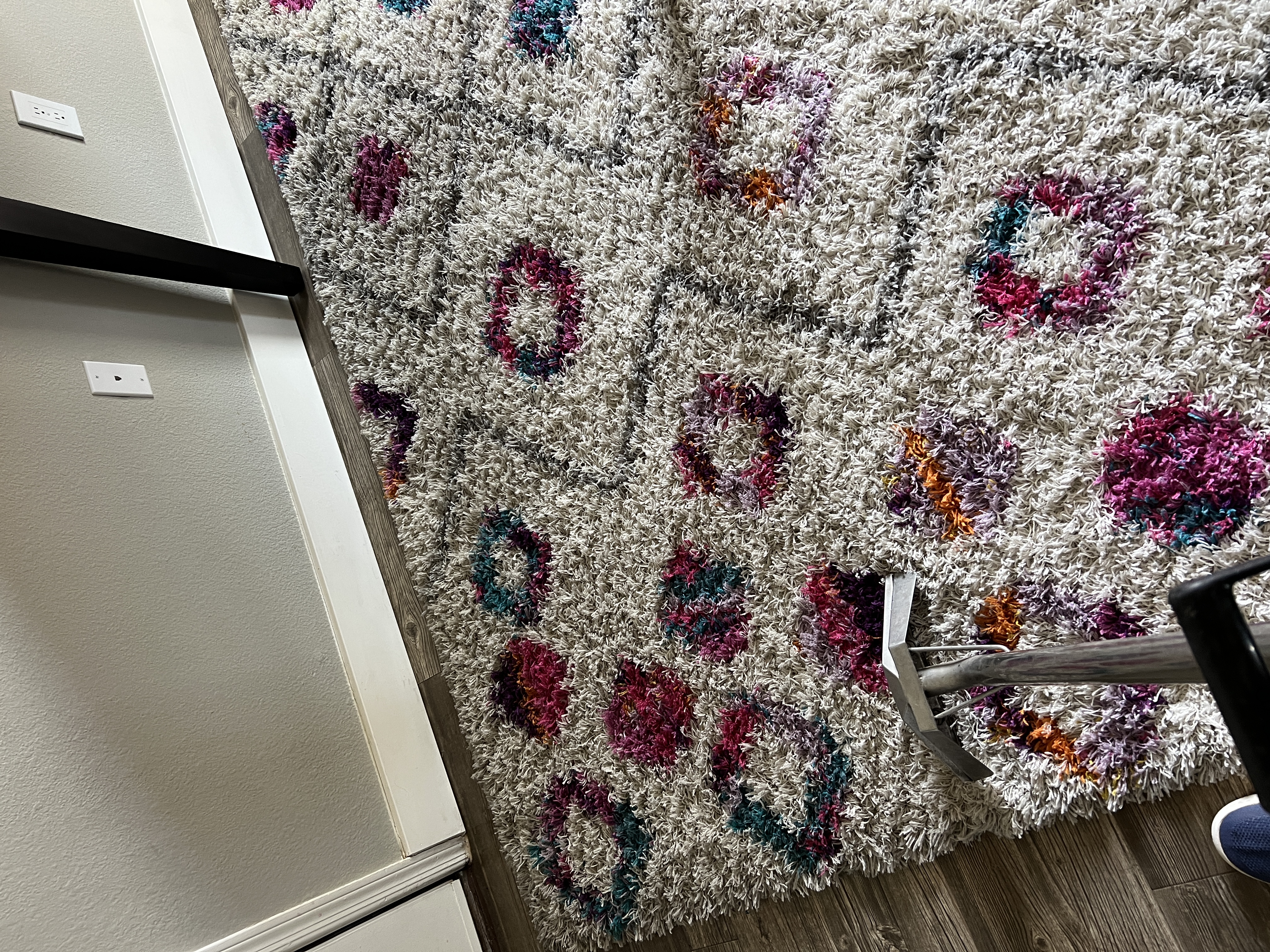 The same area rug after professional cleaning by Cade's Carpet & Floor Care