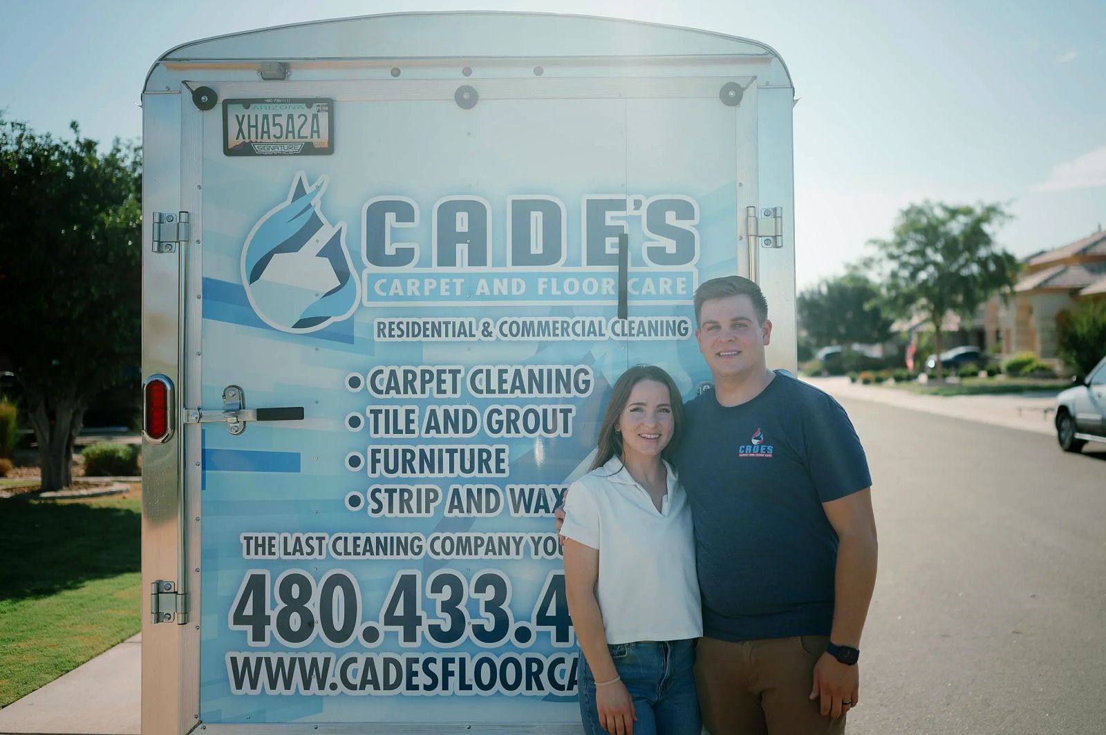 Cade Cox and his wife with the Cade's Carpet & Floor Care trailer