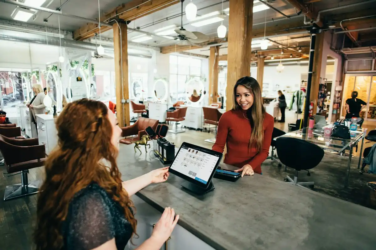Business owners reviewing plans together in their shop