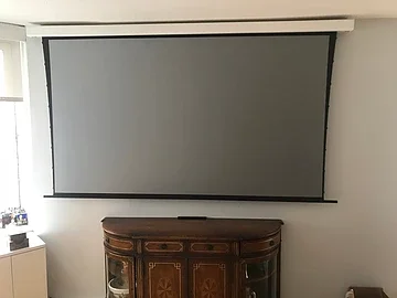 Close-up of the projector and screen housing install