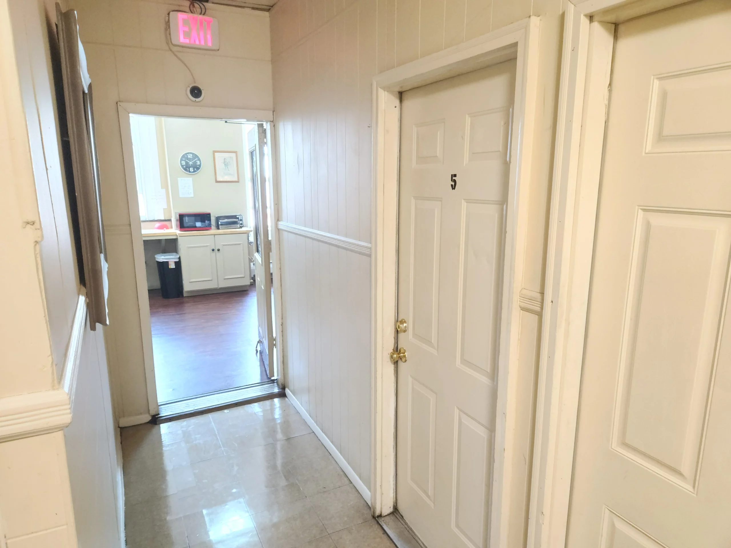 Comfortable furnished living space with fresh linens and natural light