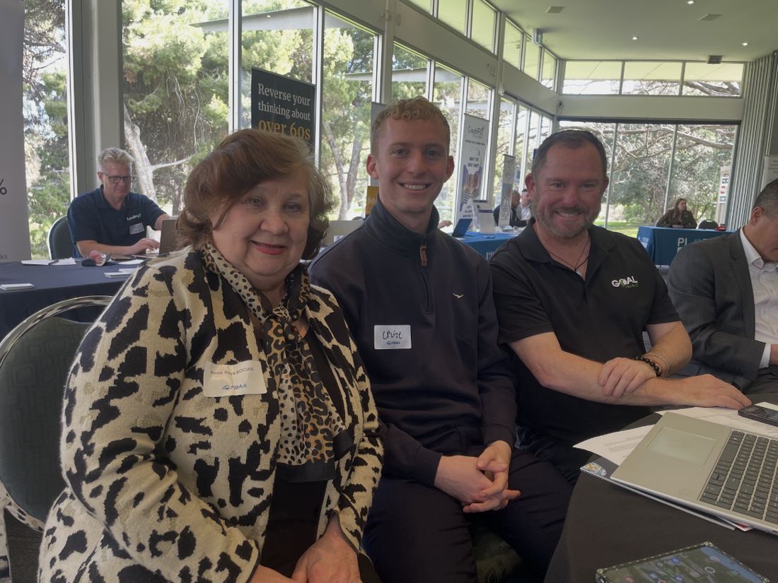 Team speaking at an industry seminar and expo