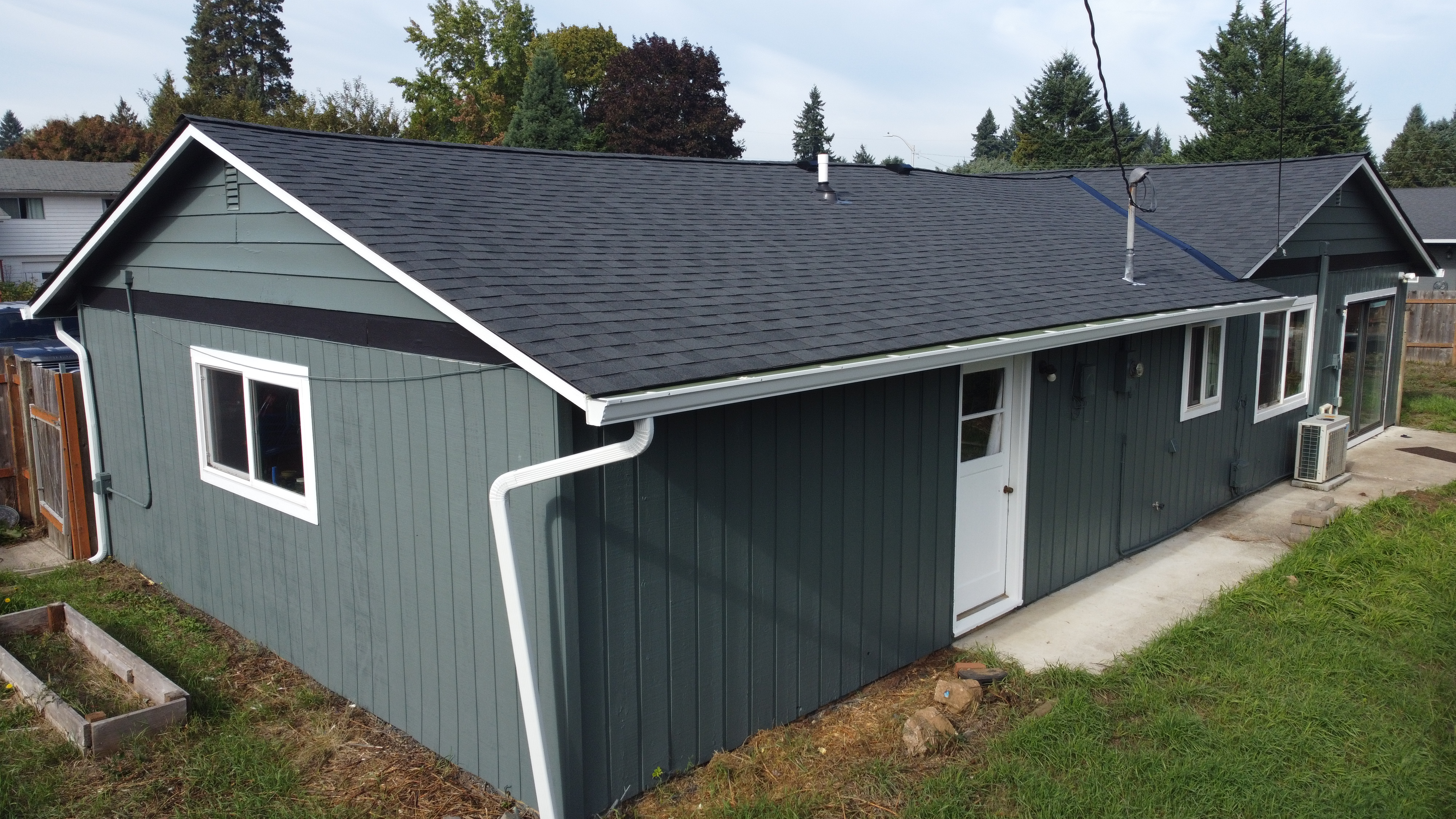 Exterior painting in Vancouver WA by AE&I Roofing and Construction