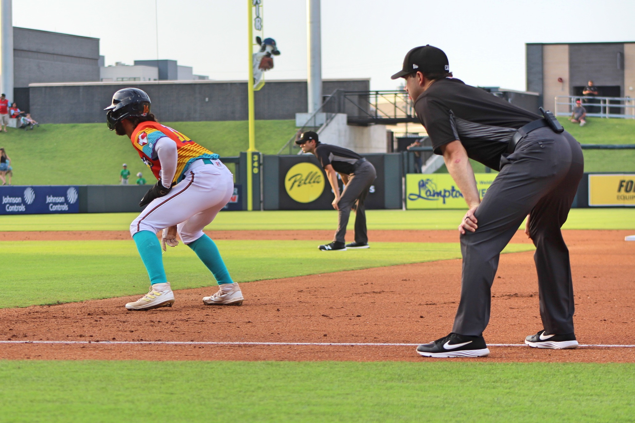 Baseball umpire making a call on bases