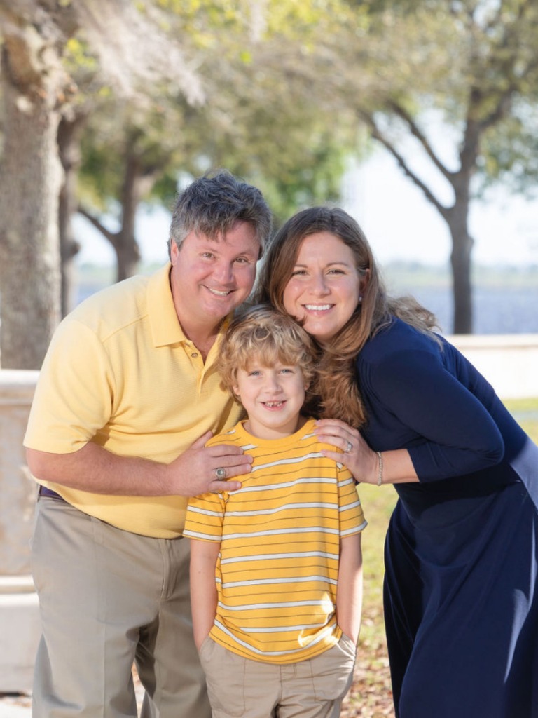 Erik Swenk with his wife and son