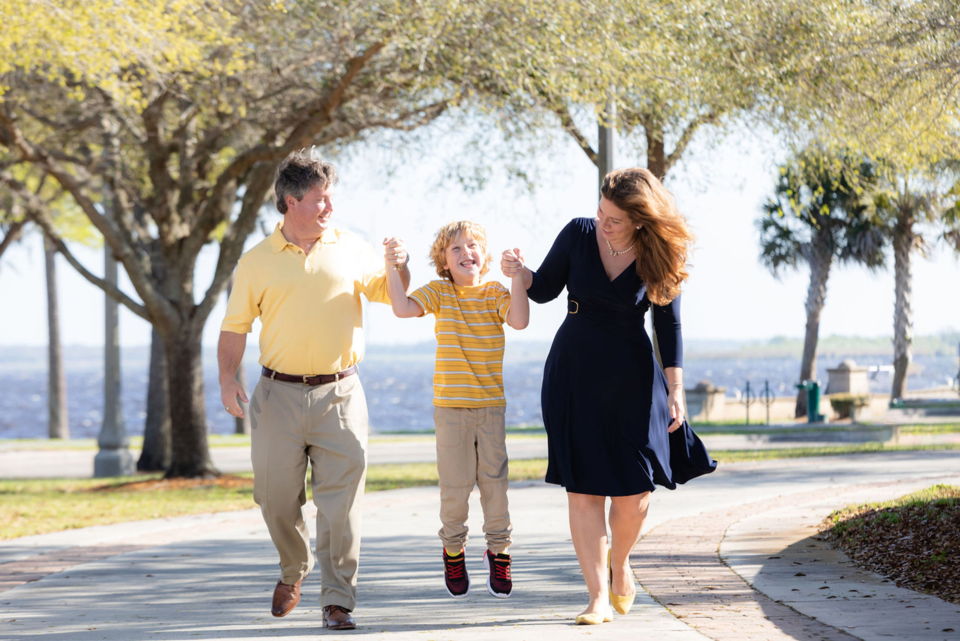 The Swenk family on a waterfront walk