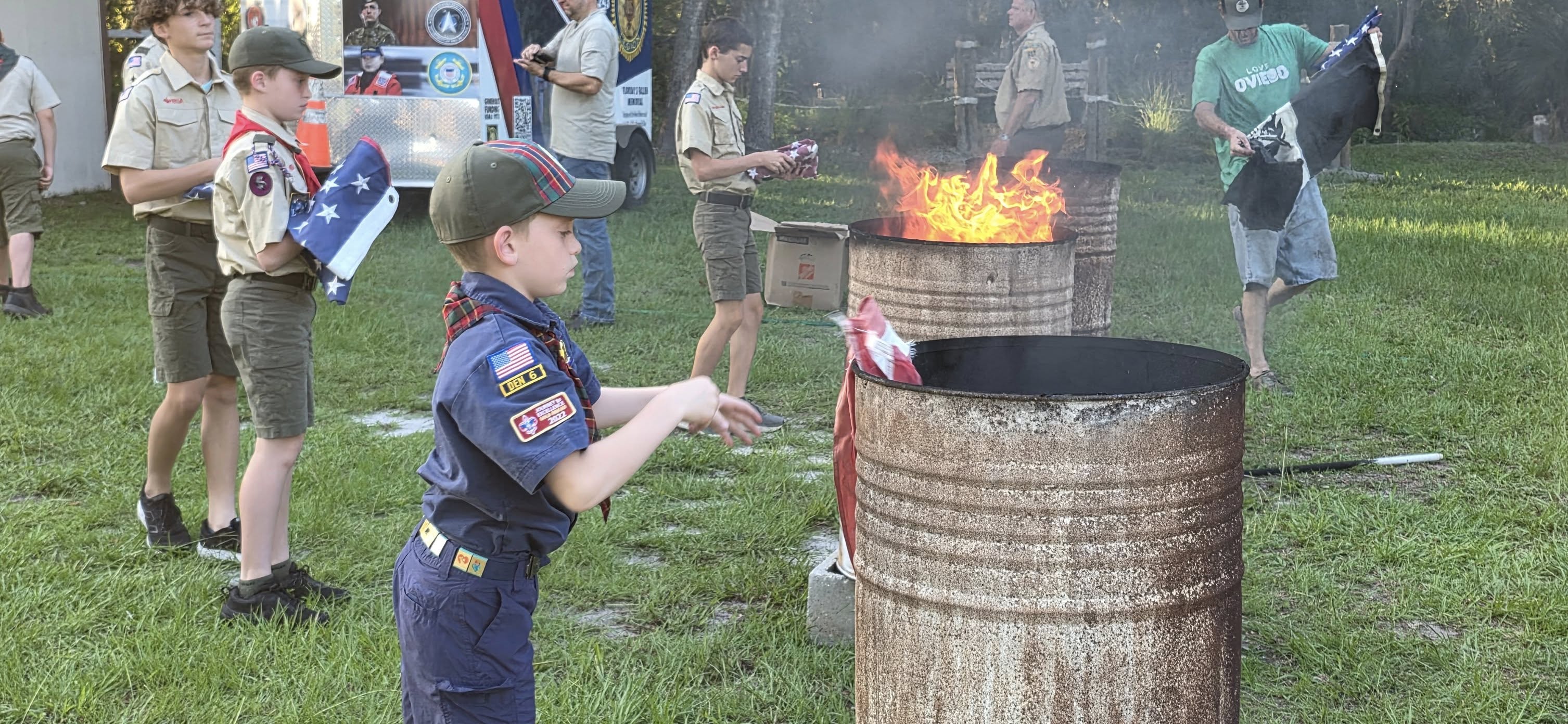 Scouts gathered around a campfire