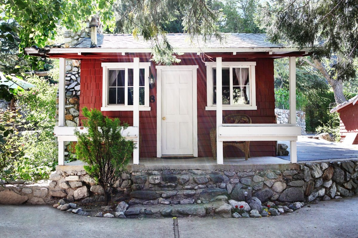 A red cabin front with white trim