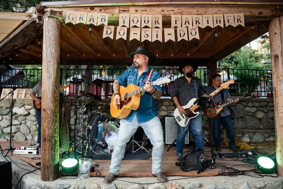 A band playing on the Lodge's outdoor stage