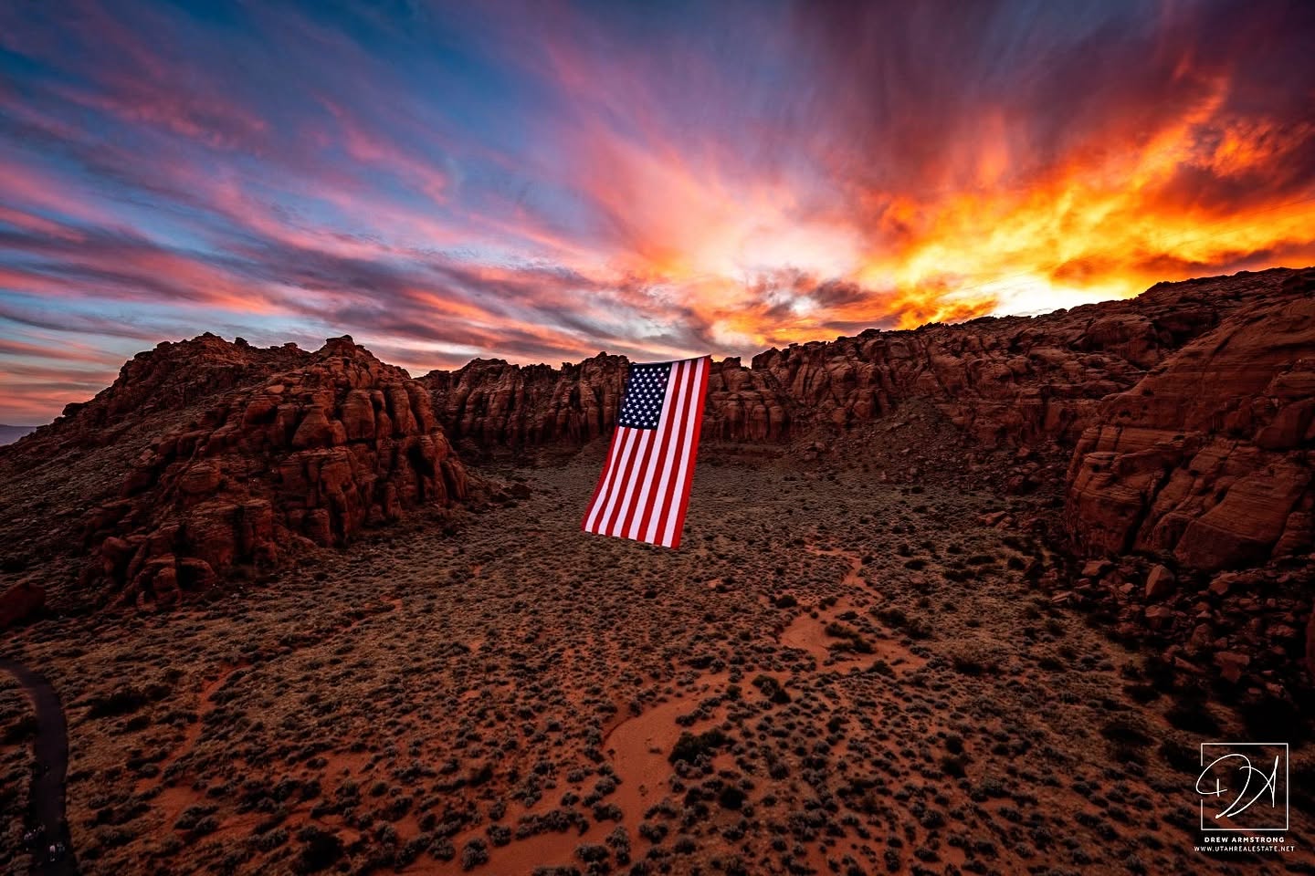 Close view of the flag fabric between the sandstone walls