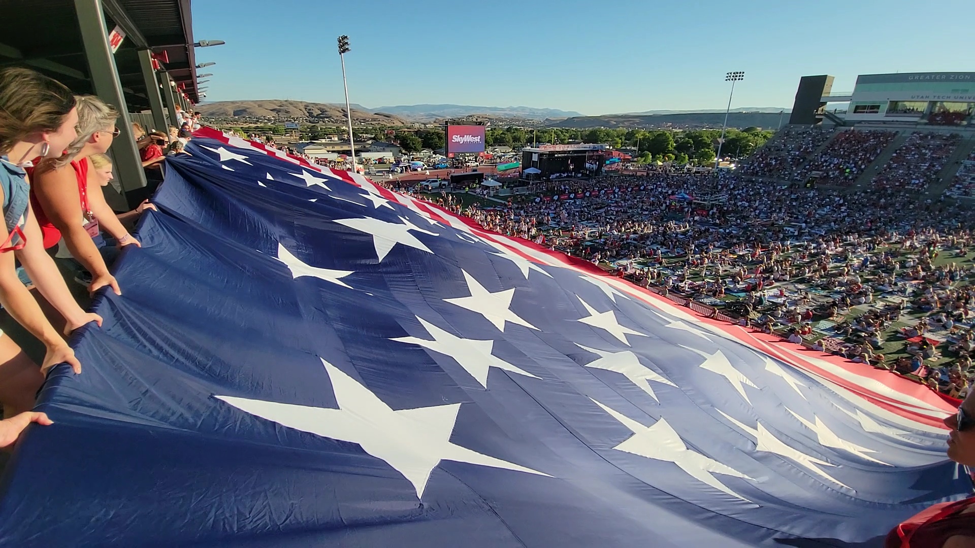 The 78-by-150-foot flag fully extended across the canyon