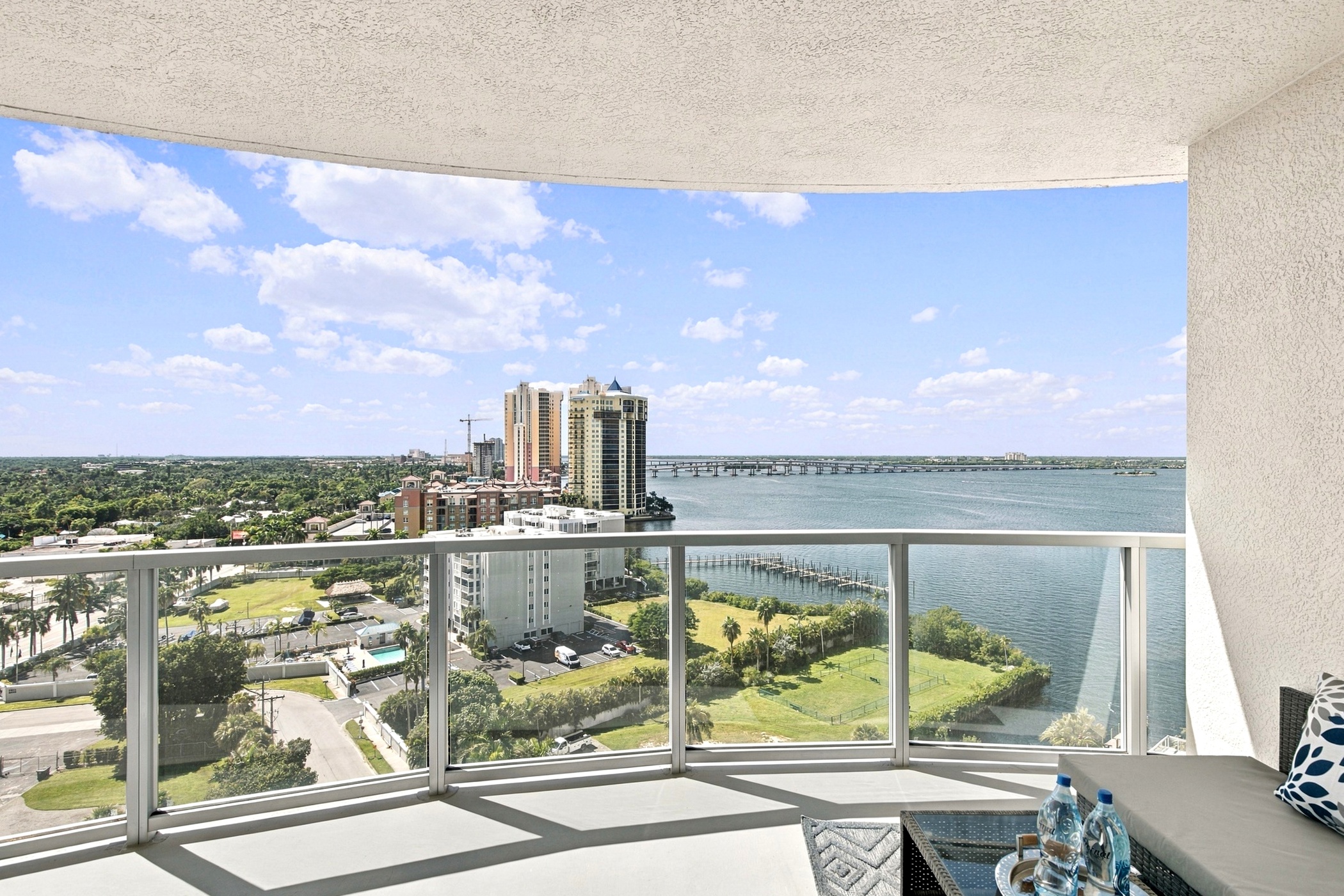 Balcony view of the Caloosahatchee River and downtown Fort Myers skyline from the 14th floor of 3000 Oasis Grand Blvd #1401