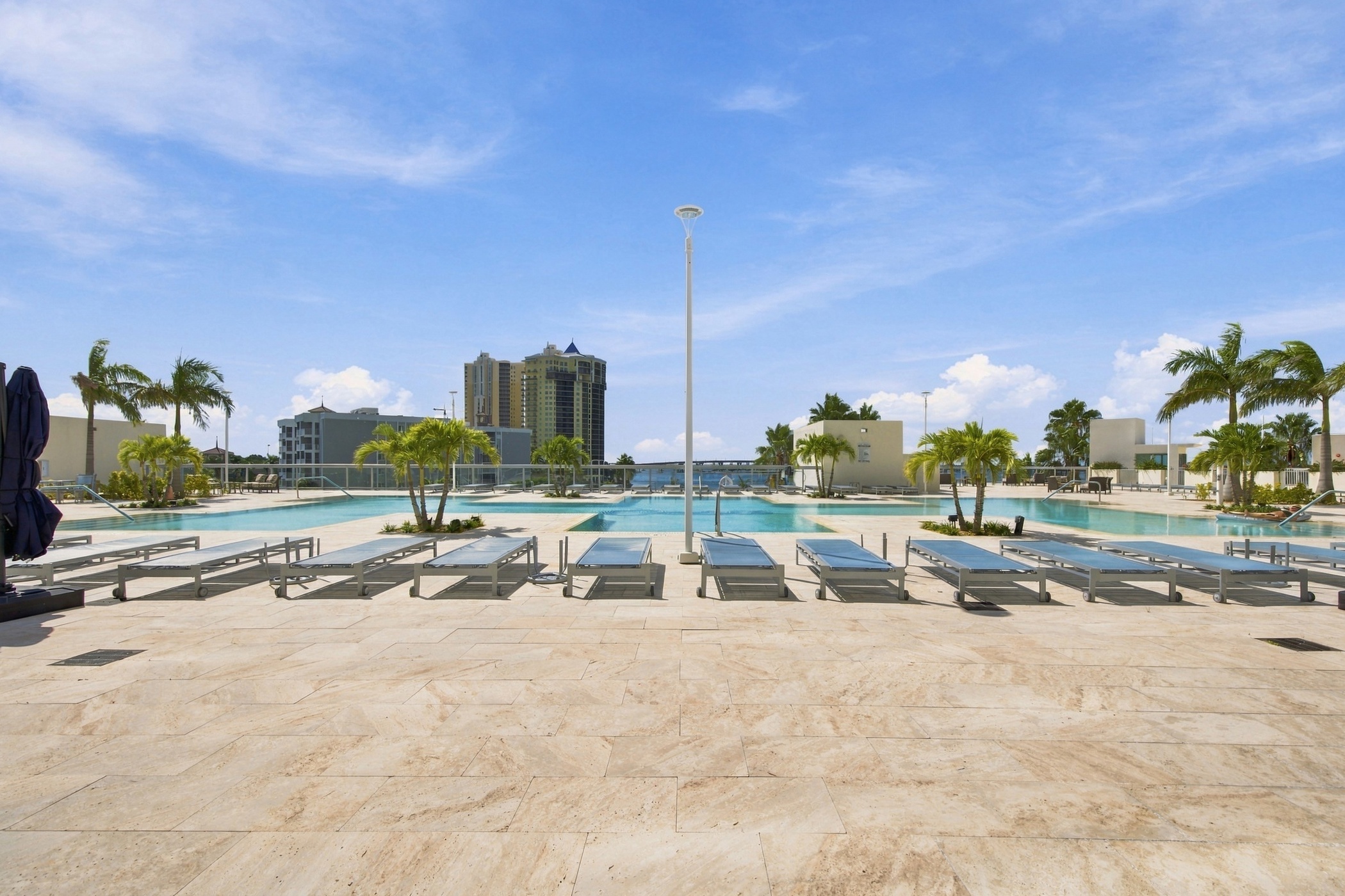 Newly redesigned resort style pool deck at Oasis Grand on the Caloosahatchee River, Fort Myers FL