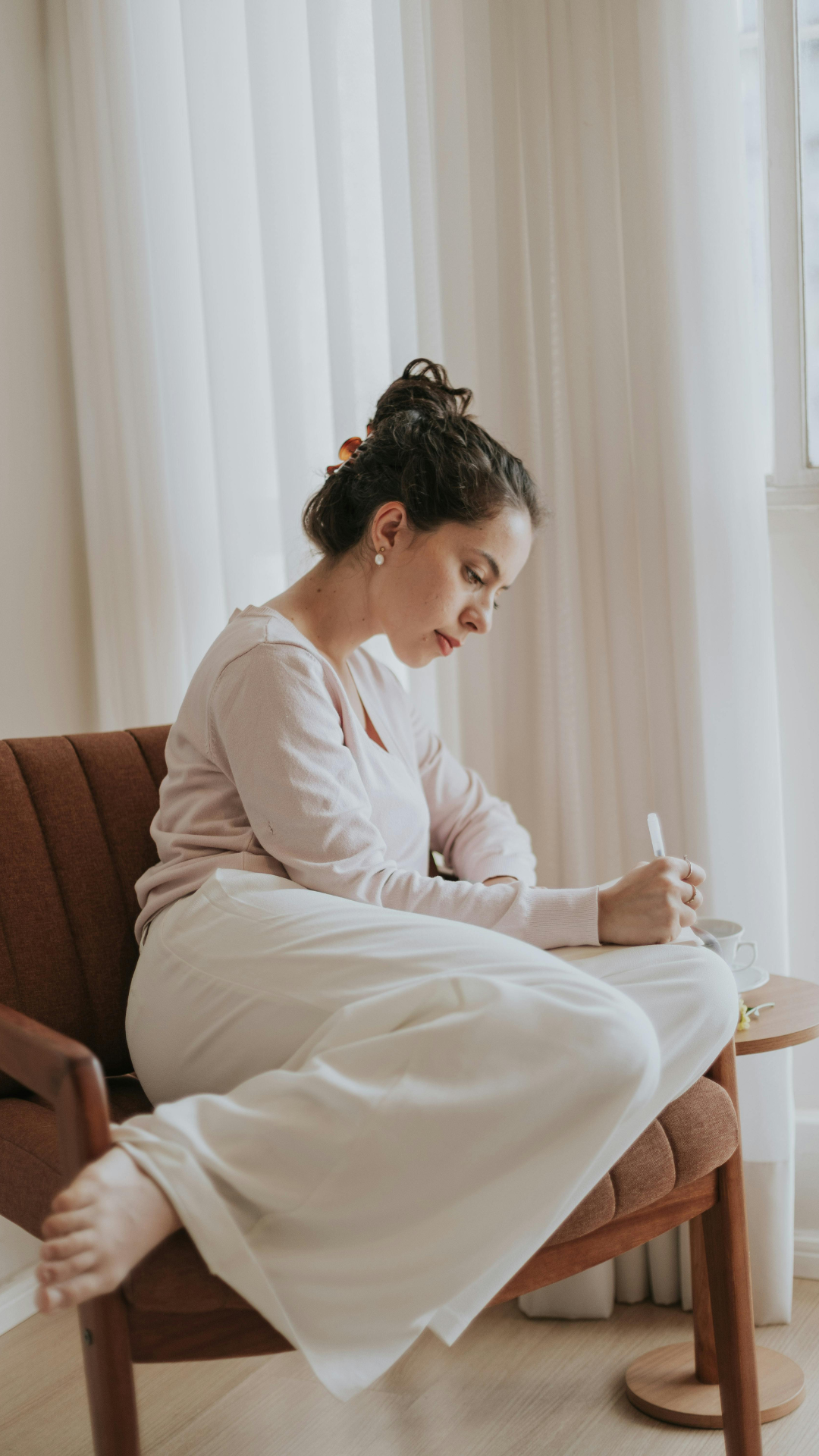 Young woman in therapy for healing generational patterns