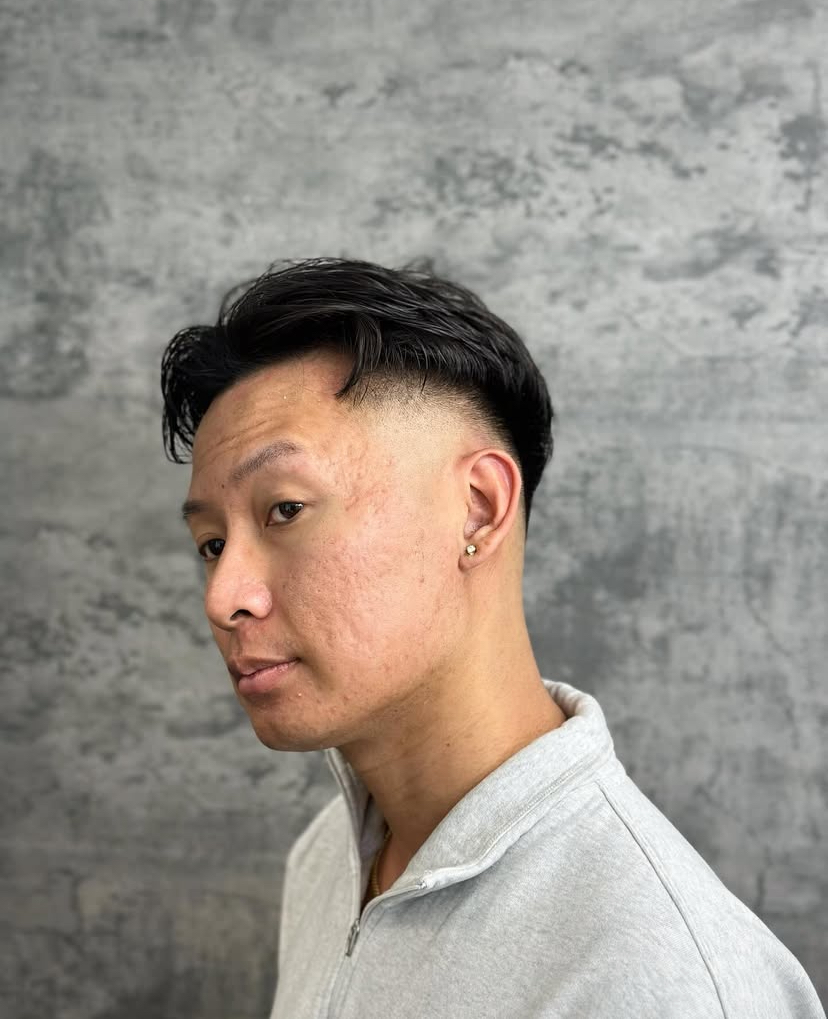 low fade haircut by barber Alexis Rivera at Blacklaces in West Hollywood, Los Angeles