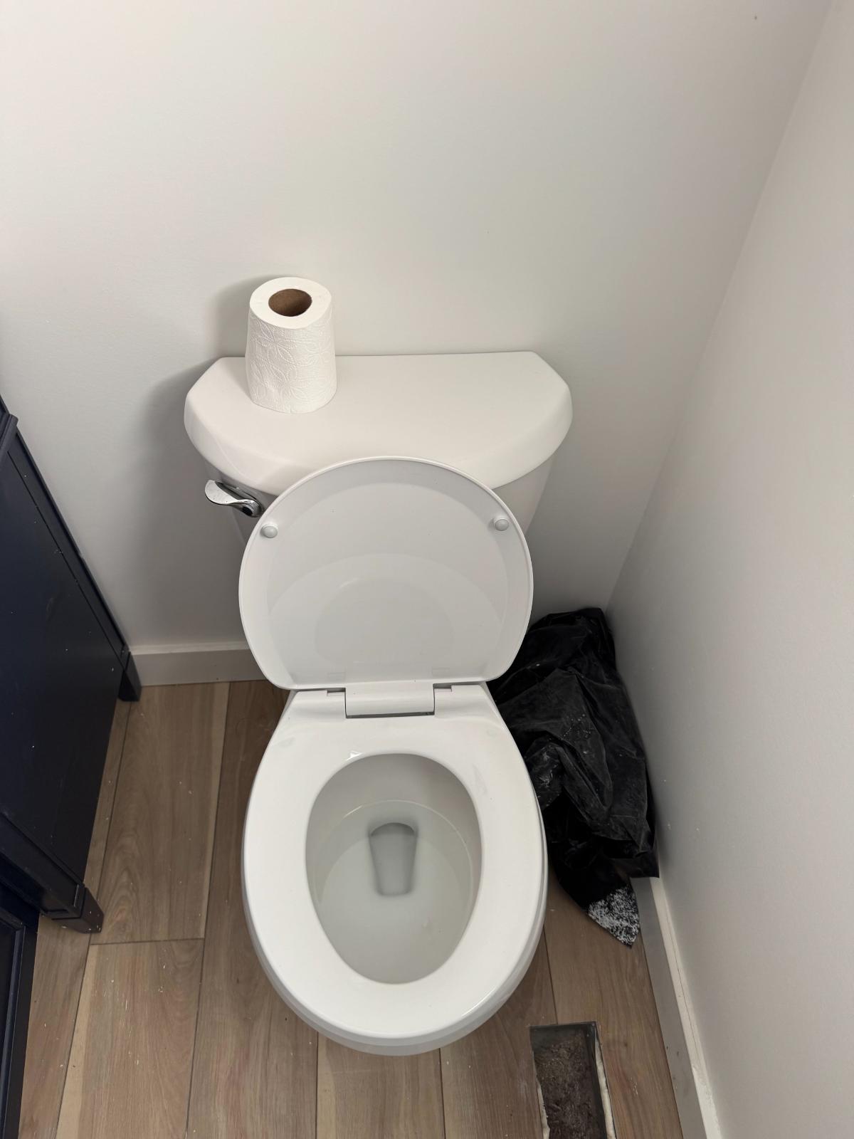 Plumber working on residential pipes
