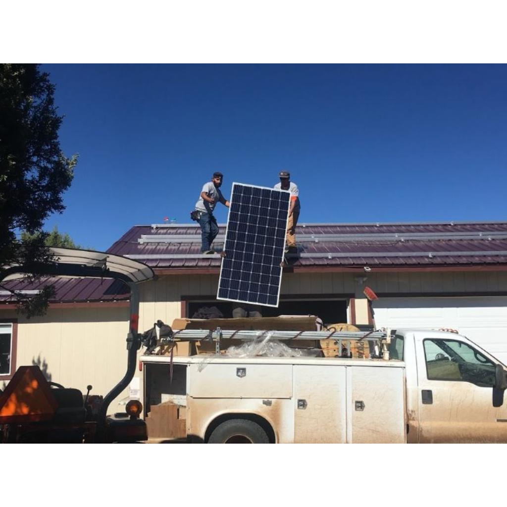 White Mountains Solar crew installing a hybrid inverter and lithium batteries in the White Mountains White Mountains Solar crew installing a hybrid inverter and lithium batteries in the White Mountains