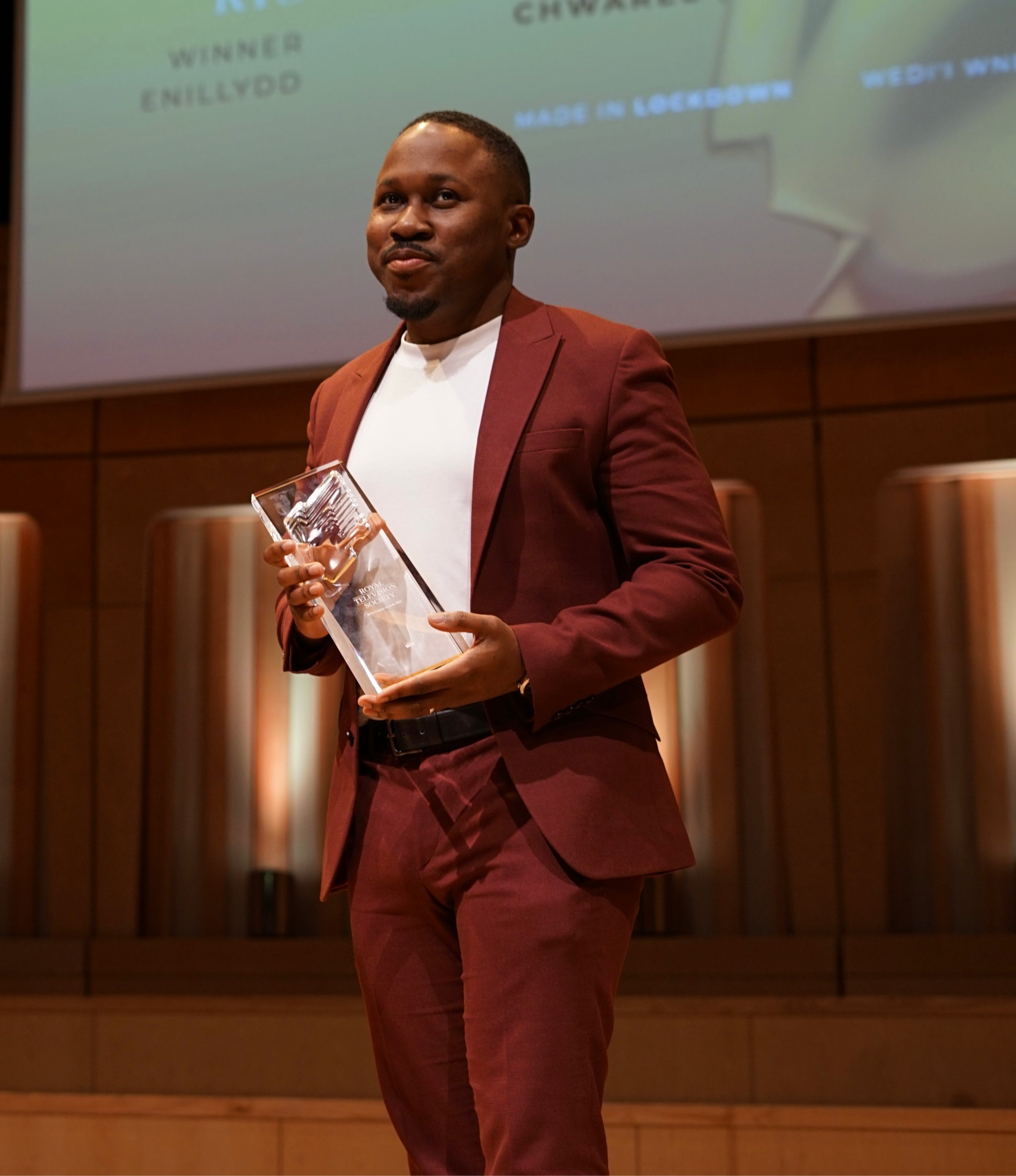 Tayo with a television award