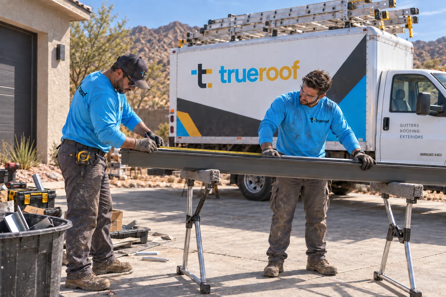 Nevada workwear concept: TrueRoof gutter installers in cyan uniforms